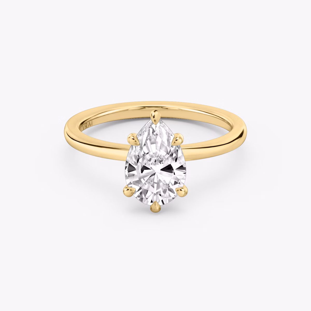6-Prong Yellow Gold solitaire engagement ring with Pear cut diamond