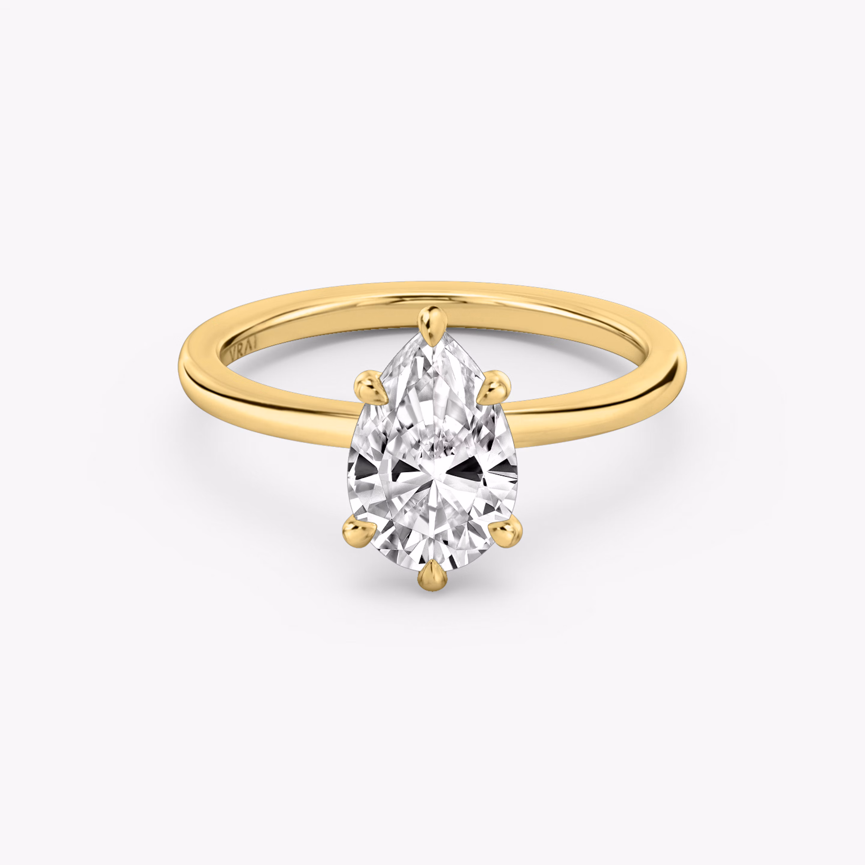 6-Prong Yellow Gold solitaire engagement ring with Pear cut diamond