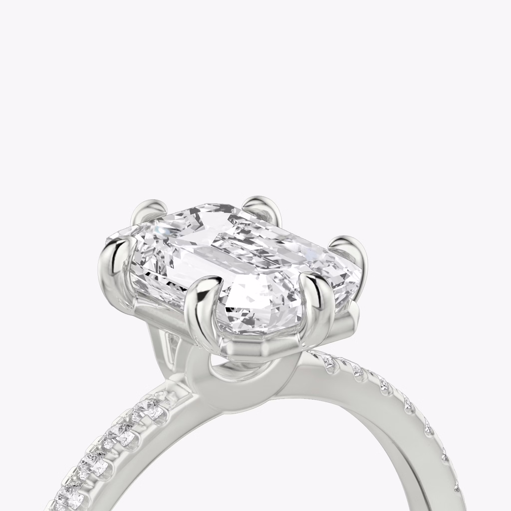 The Signature 6 Prong | Emerald | 18k | White Gold | bandAccent: Pavé | bandWidth: standard | hiddenHalo: no | diamondOrientation: vertical | caratWeight: other