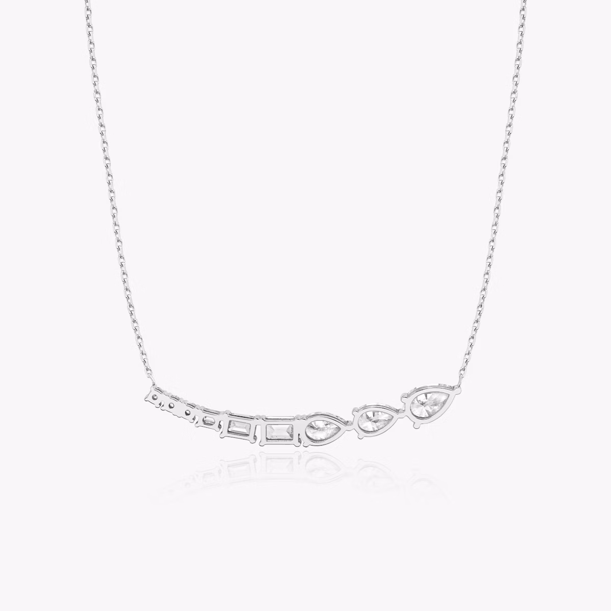 Neptune Floating Halskette | pear+round-brilliant+emerald | 14k | Weißgold | chainLength: 16-18