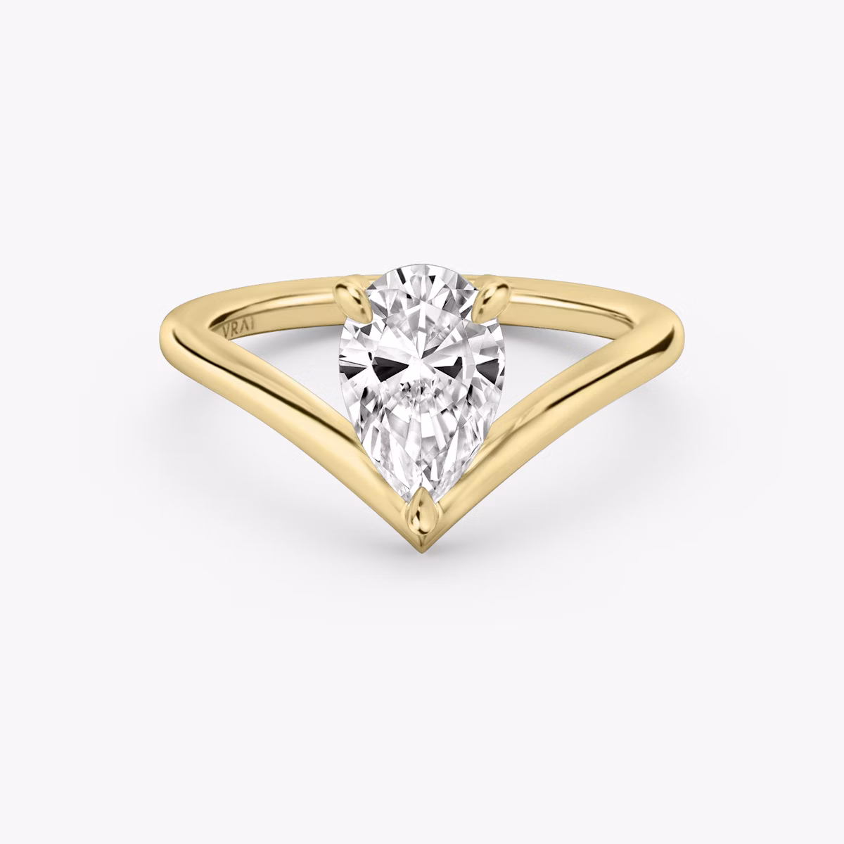Signature V ring pear cut yellow gold