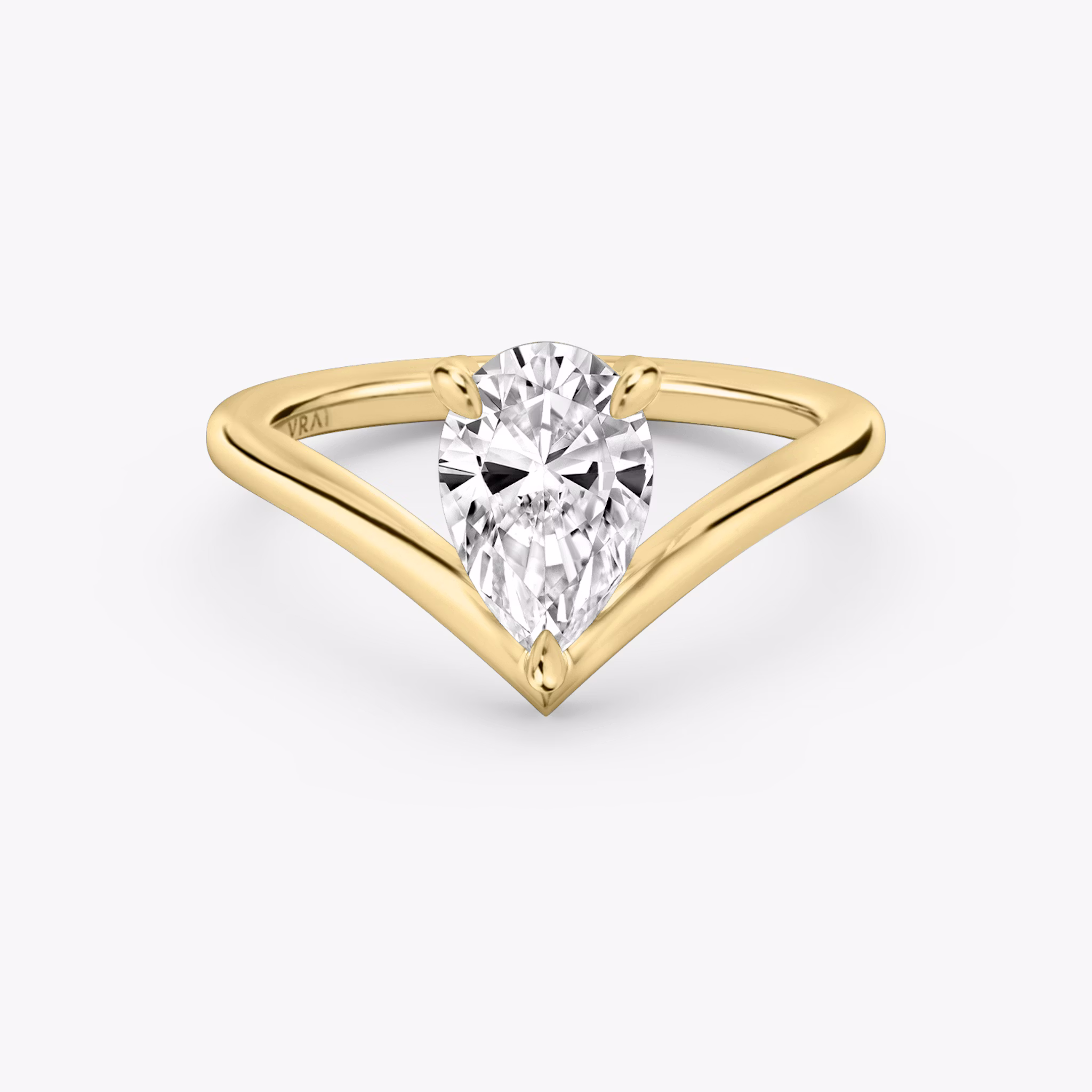 Signature V ring pear cut yellow gold