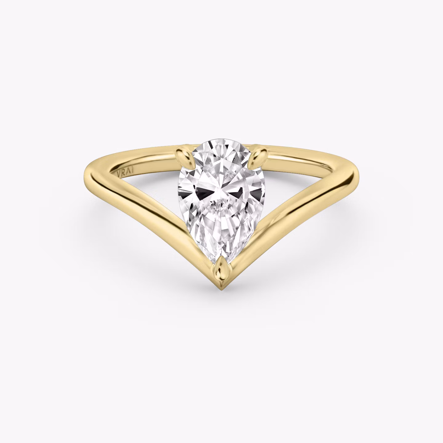 Signature V ring pear cut yellow gold