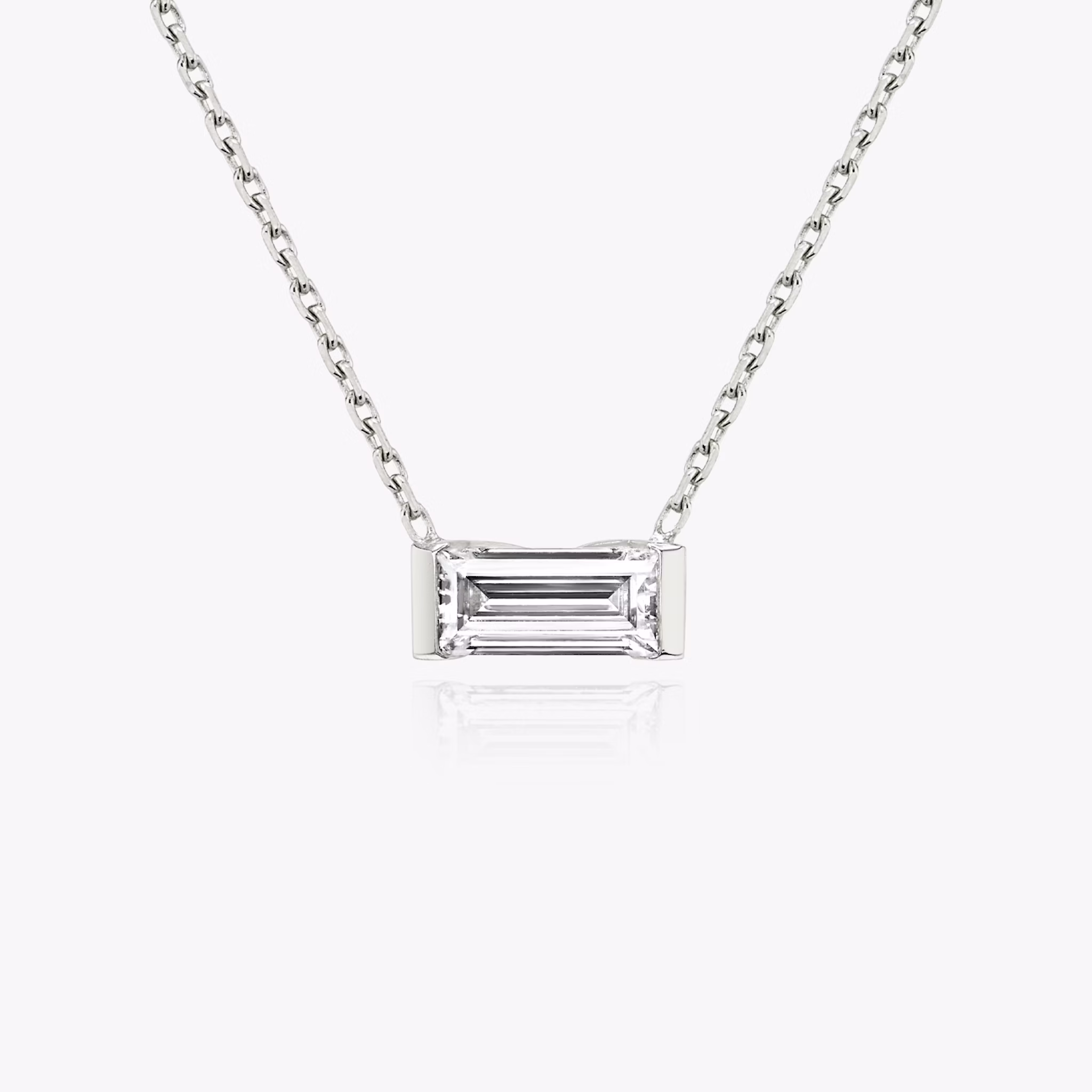 The Knife-Edge Baguette Semi-Bezel Necklace in white gold.