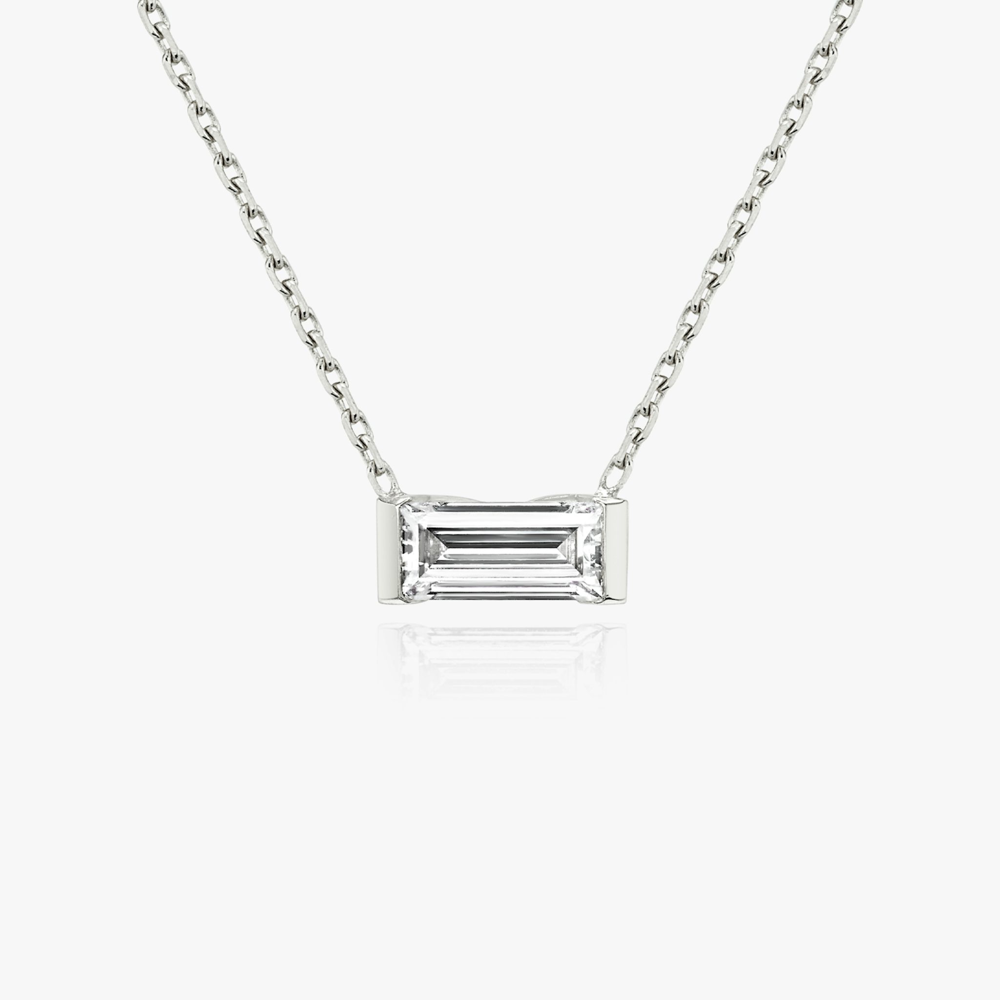 The Knife-Edge Baguette Semi-Bezel Necklace in white gold.