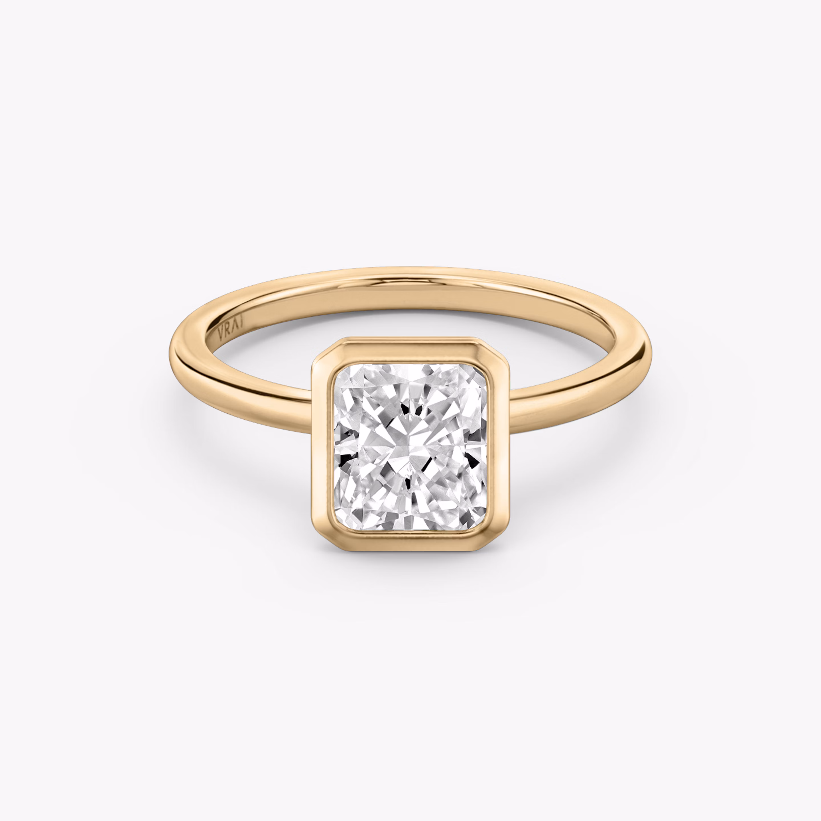 Rose gold Signature Bezel engagement ring with Radiant cut diamond