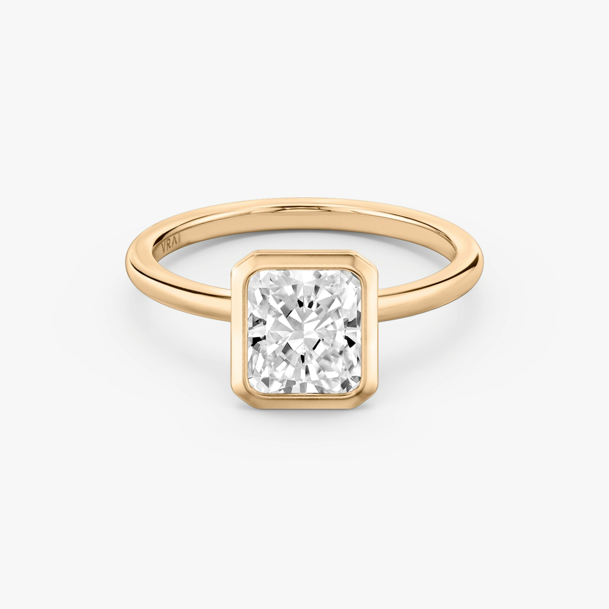Rose gold Signature Bezel engagement ring with Radiant cut diamond
