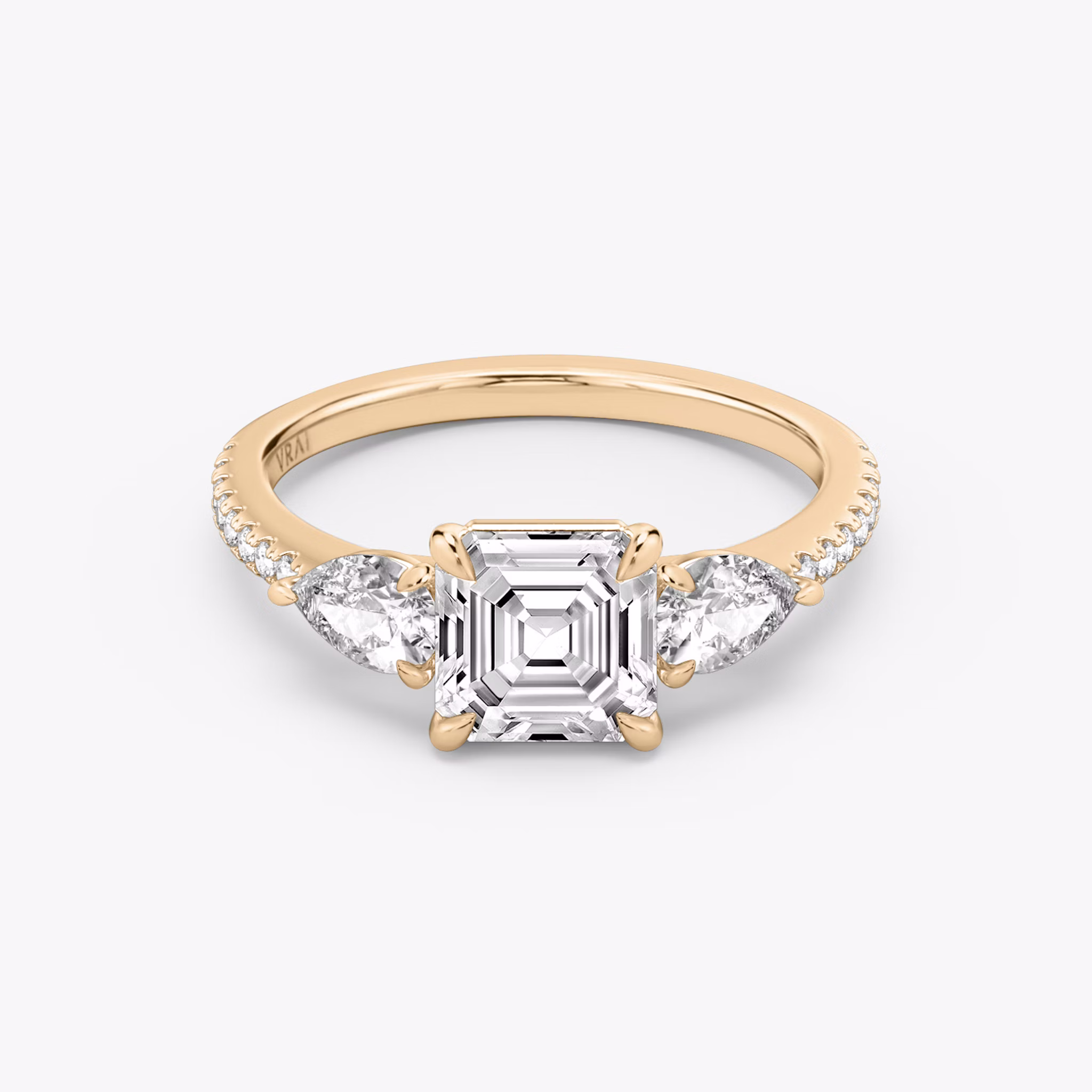 The Three Stone | Asscher | 14k | Rose Gold | bandAccent: Pavé | sideStoneCarat: 0.25ct | sideStoneShape: Pear | diamondOrientation: vertical | caratWeight: other