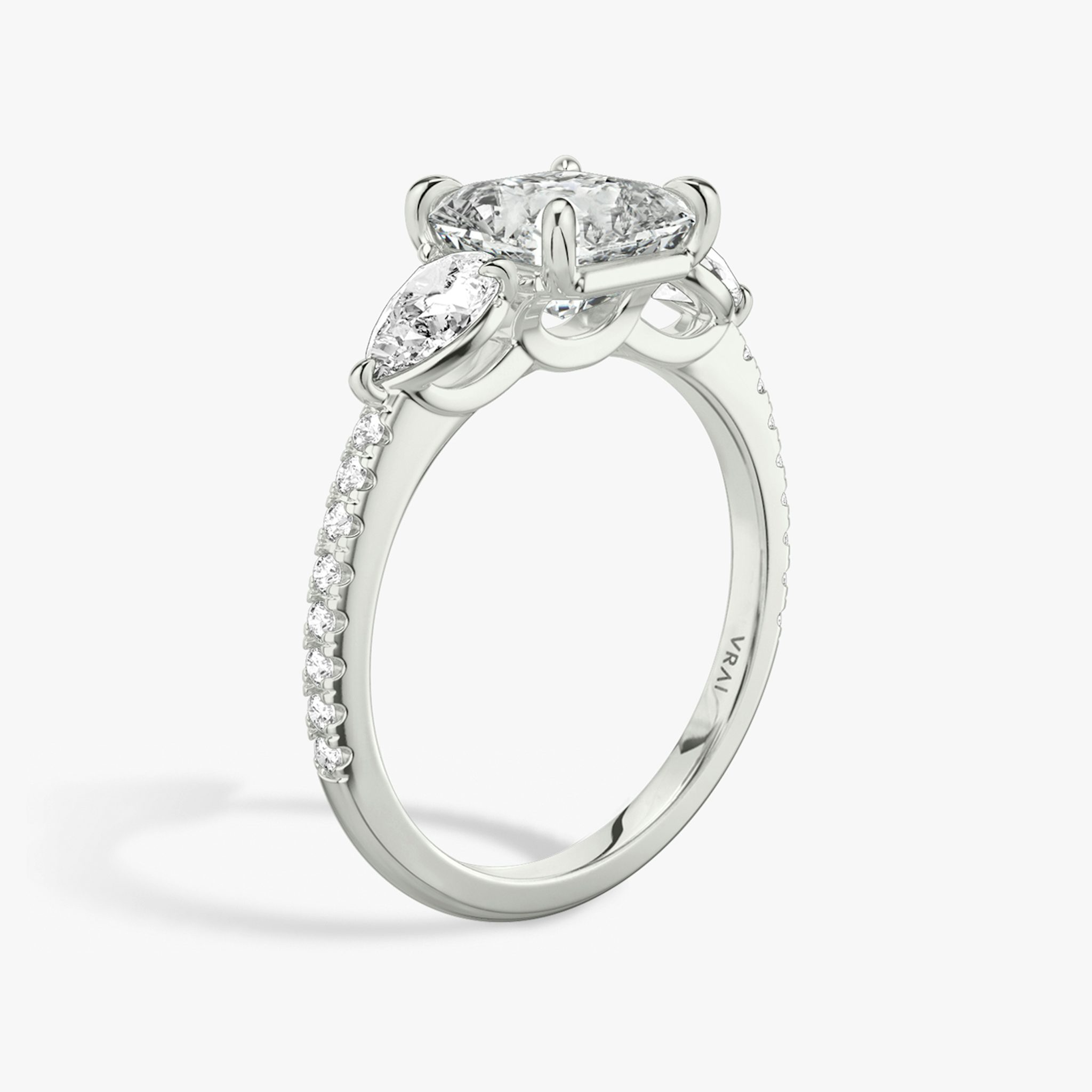 The Three Stone | Asscher | Platinum | bandAccent: Pavé | sideStoneCarat: 0.25ct | sideStoneShape: Pear | diamondOrientation: vertical | caratWeight: other