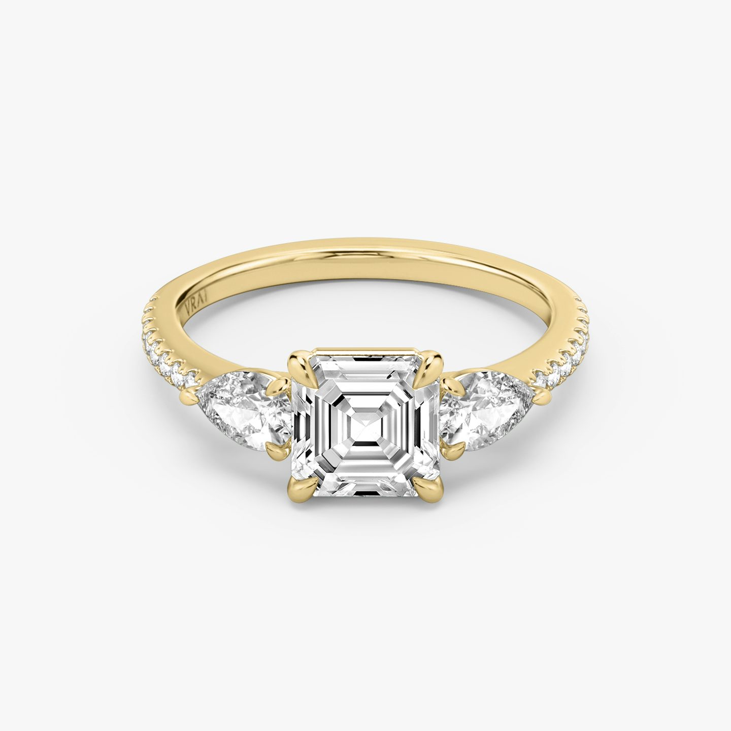 The Three Stone | Asscher | 18k | Yellow Gold | bandAccent: Pavé | sideStoneCarat: 0.25ct | sideStoneShape: Pear | diamondOrientation: vertical | caratWeight: other