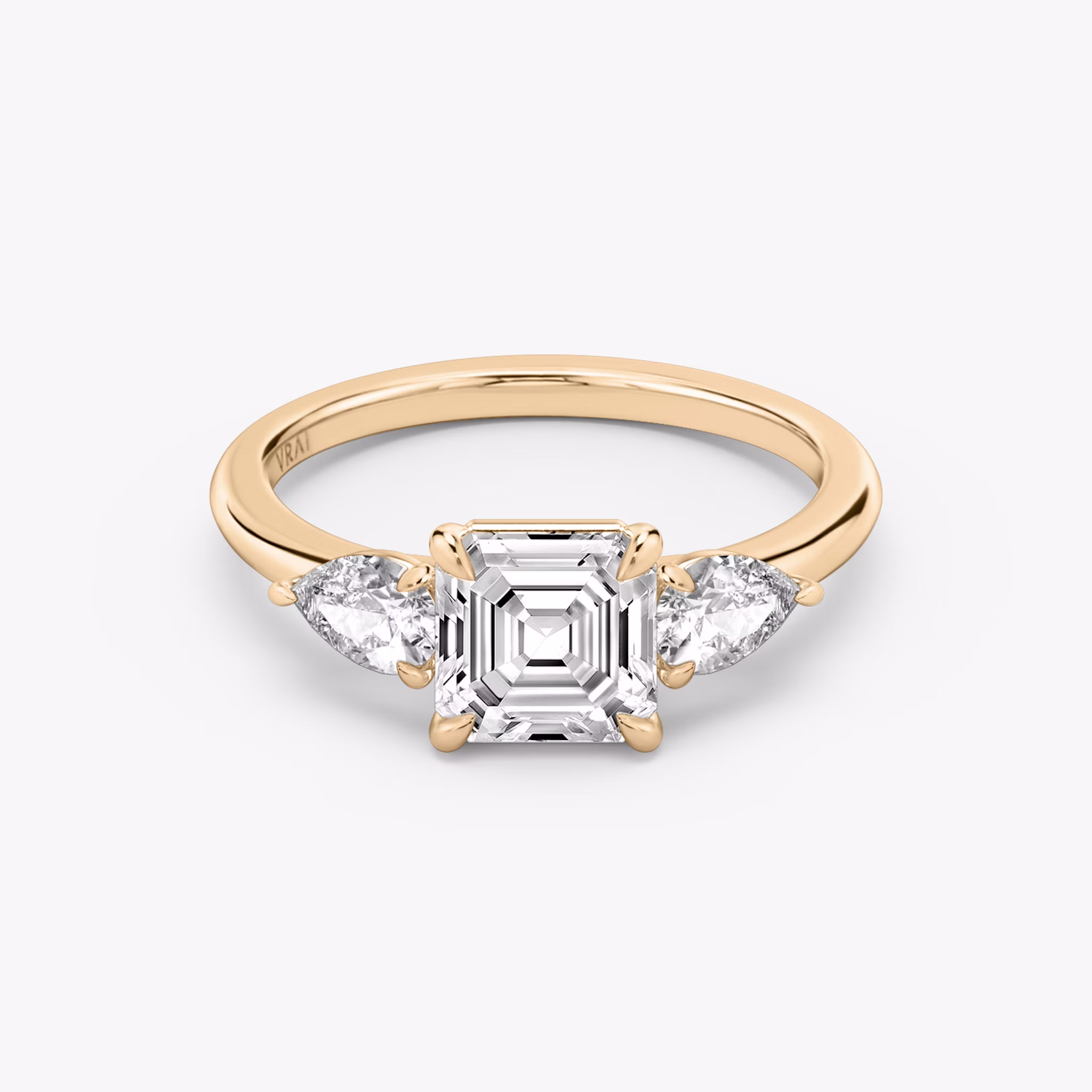 The Three Stone | Asscher | 14k | Rose Gold | bandAccent: Plain | sideStoneCarat: 0.25ct | sideStoneShape: Pear | diamondOrientation: vertical | caratWeight: other