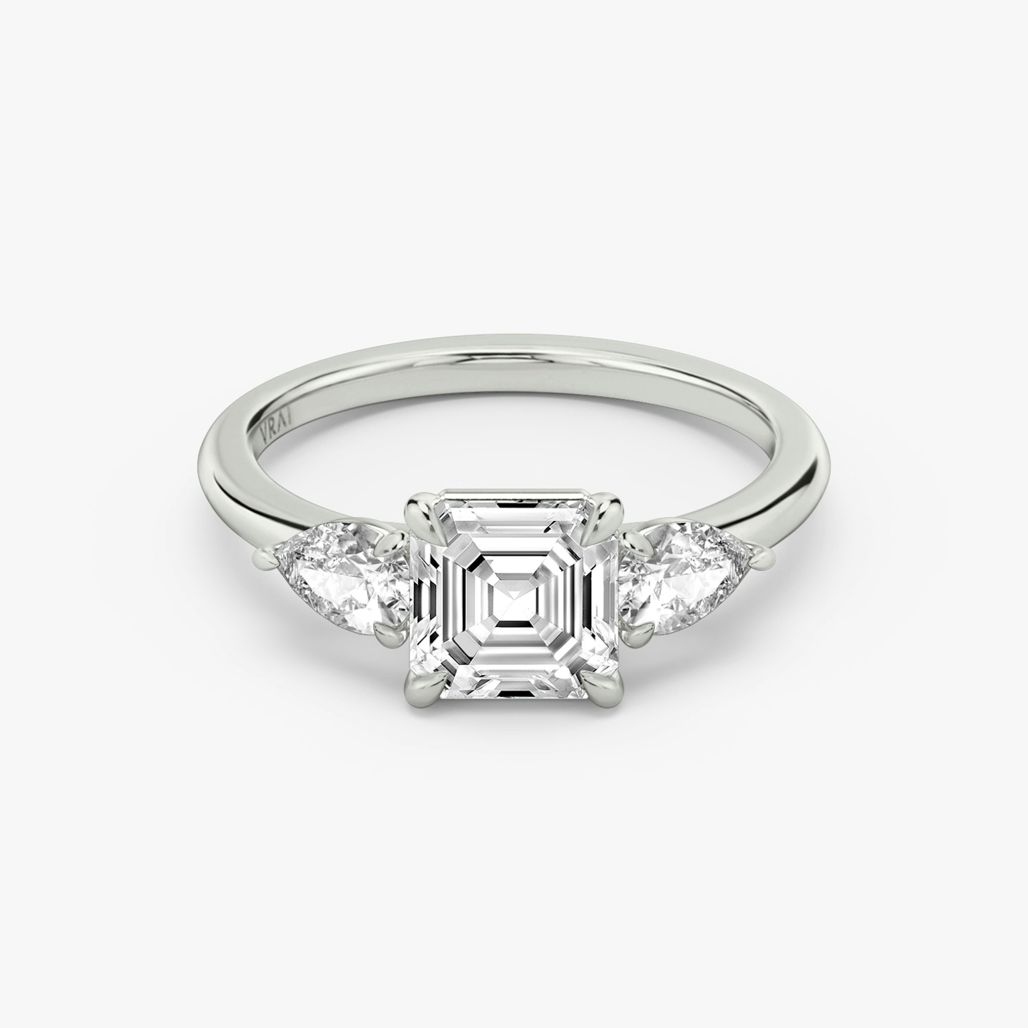 The Three Stone | Asscher | Platinum | bandAccent: Plain | sideStoneCarat: 0.25ct | sideStoneShape: Pear | diamondOrientation: vertical | caratWeight: other