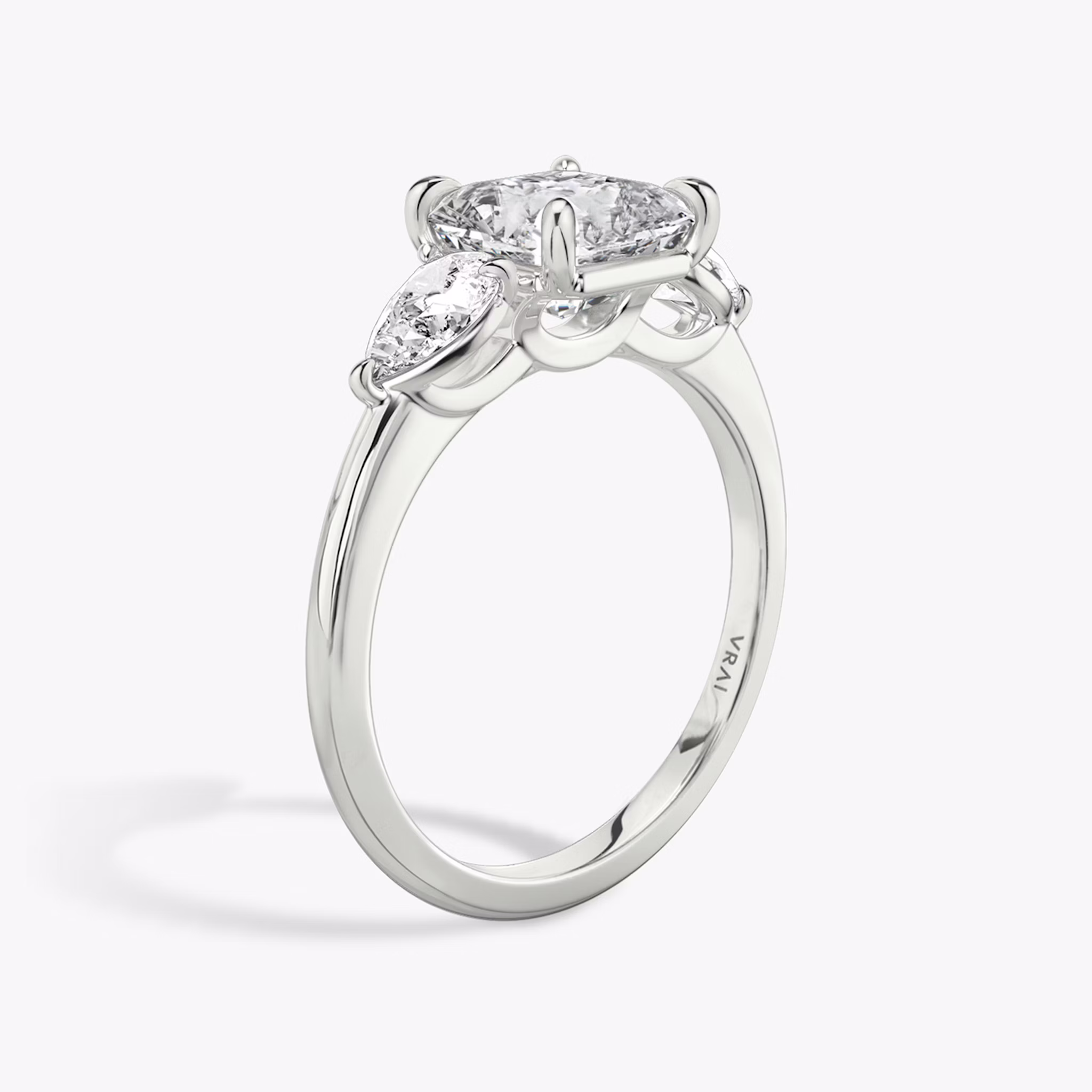 The Three Stone | Asscher | Platinum | bandAccent: Plain | sideStoneCarat: 0.25ct | sideStoneShape: Pear | diamondOrientation: vertical | caratWeight: other