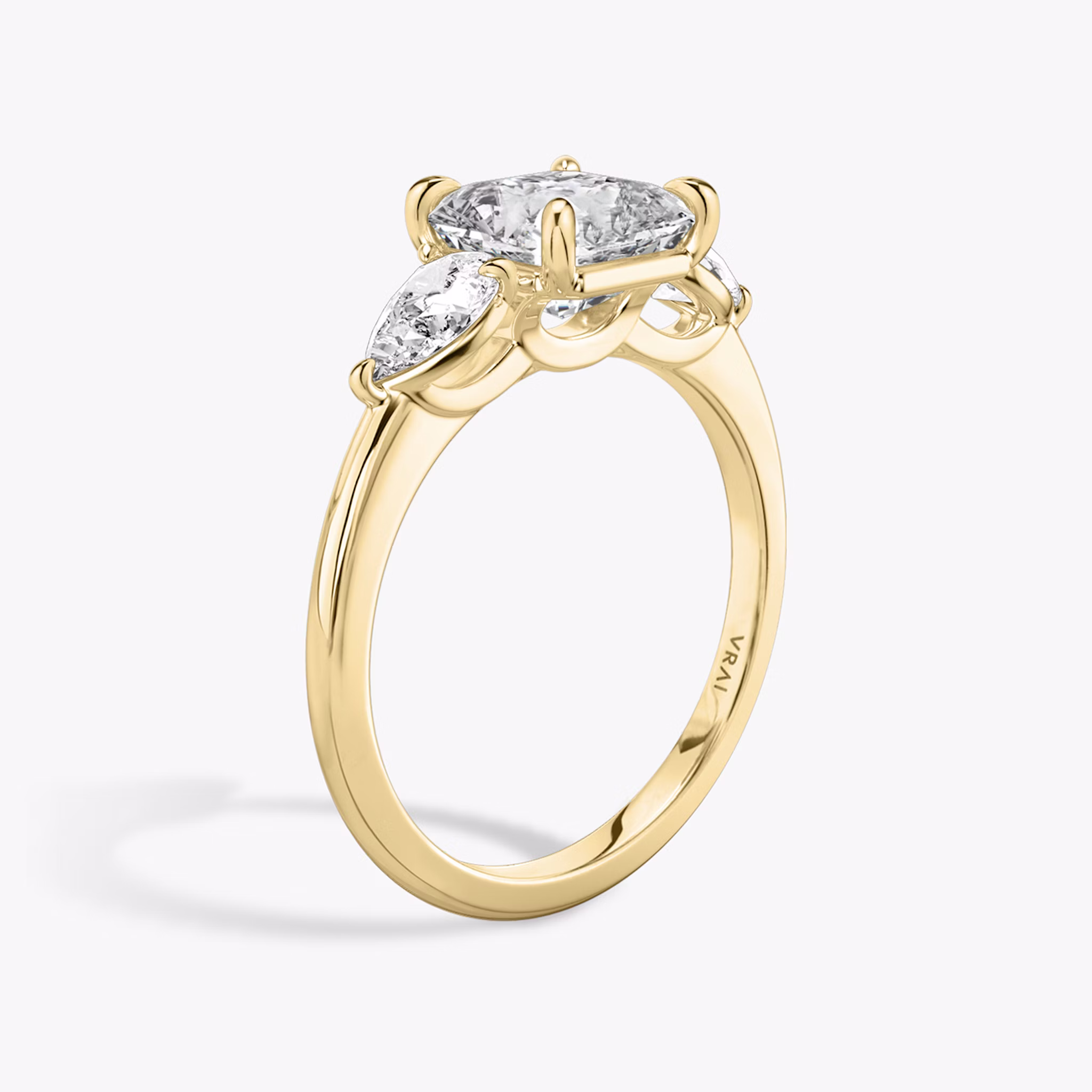 The Three Stone | Asscher | 18k | Yellow Gold | bandAccent: Plain | sideStoneCarat: 0.25ct | sideStoneShape: Pear | diamondOrientation: vertical | caratWeight: other