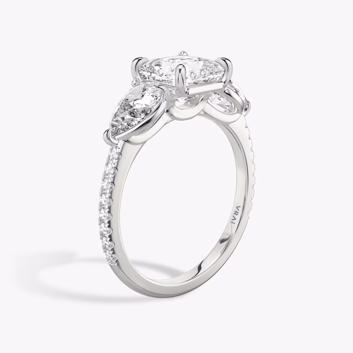 The Three Stone | Asscher | Platinum | bandAccent: Pavé | sideStoneCarat: 0.50ct | sideStoneShape: Pear | diamondOrientation: vertical | caratWeight: other