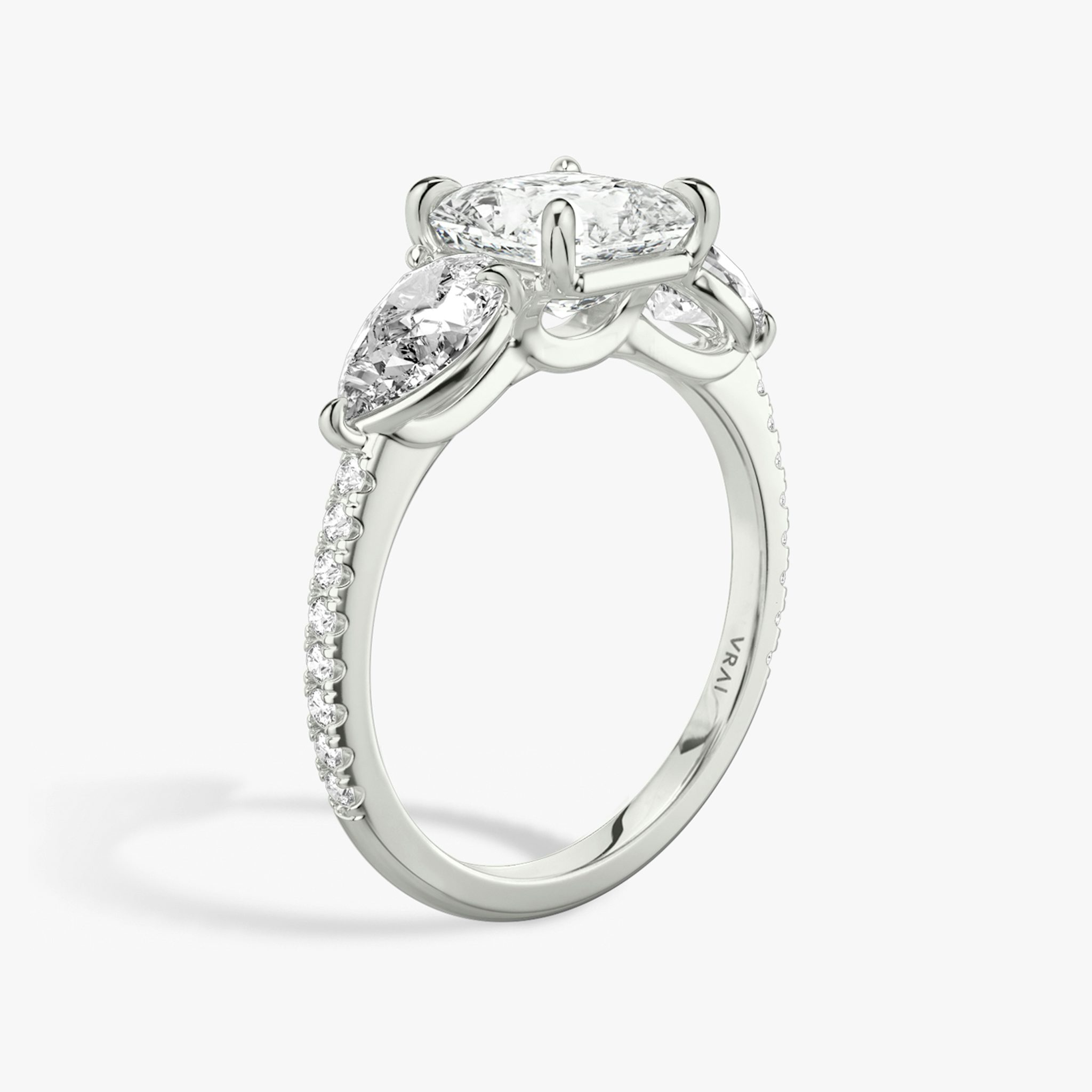 The Three Stone | Asscher | 18k | White Gold | bandAccent: Pavé | sideStoneCarat: 0.50ct | sideStoneShape: Pear | diamondOrientation: vertical | caratWeight: other