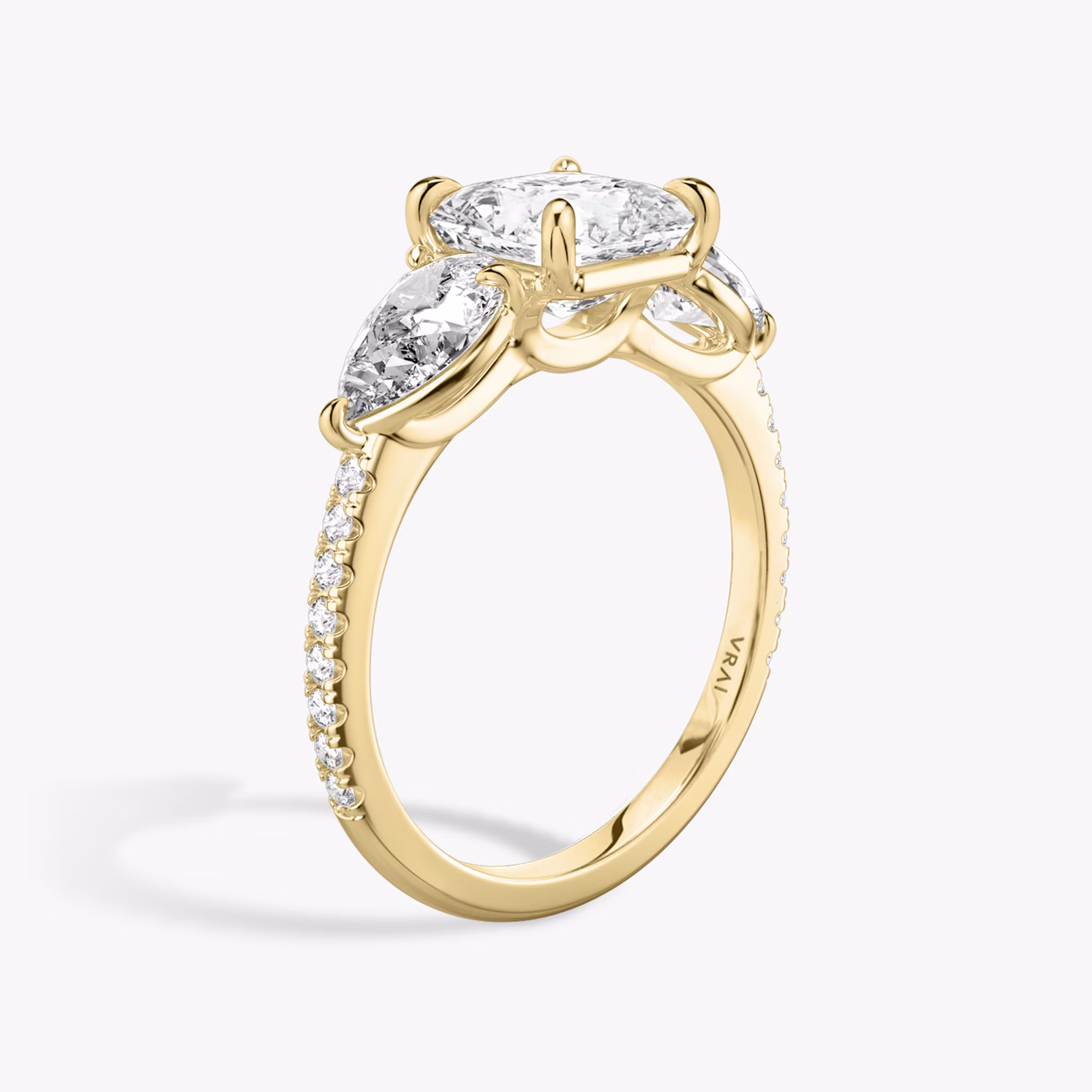 The Three Stone | Asscher | 18k | Yellow Gold | bandAccent: Pavé | sideStoneCarat: 0.50ct | sideStoneShape: Pear | diamondOrientation: vertical | caratWeight: other