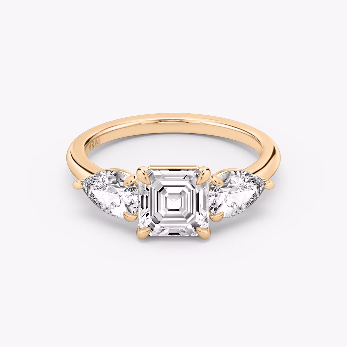 The Three Stone | Asscher | 14k | Rose Gold | bandAccent: Plain | sideStoneCarat: 0.50ct | sideStoneShape: Pear | diamondOrientation: vertical | caratWeight: other