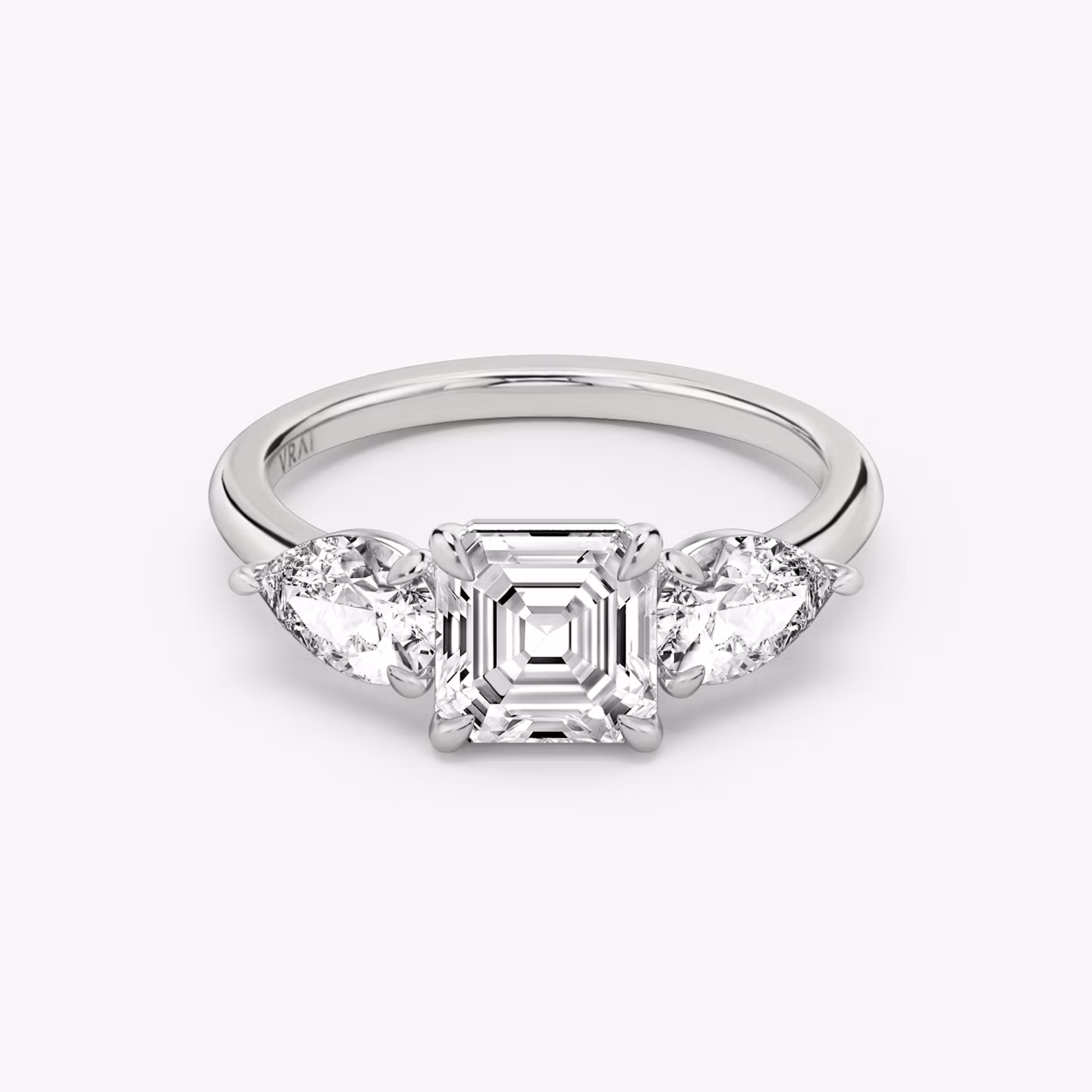 The Three Stone | Asscher | Platinum | bandAccent: Plain | sideStoneCarat: 0.50ct | sideStoneShape: Pear | diamondOrientation: vertical | caratWeight: other