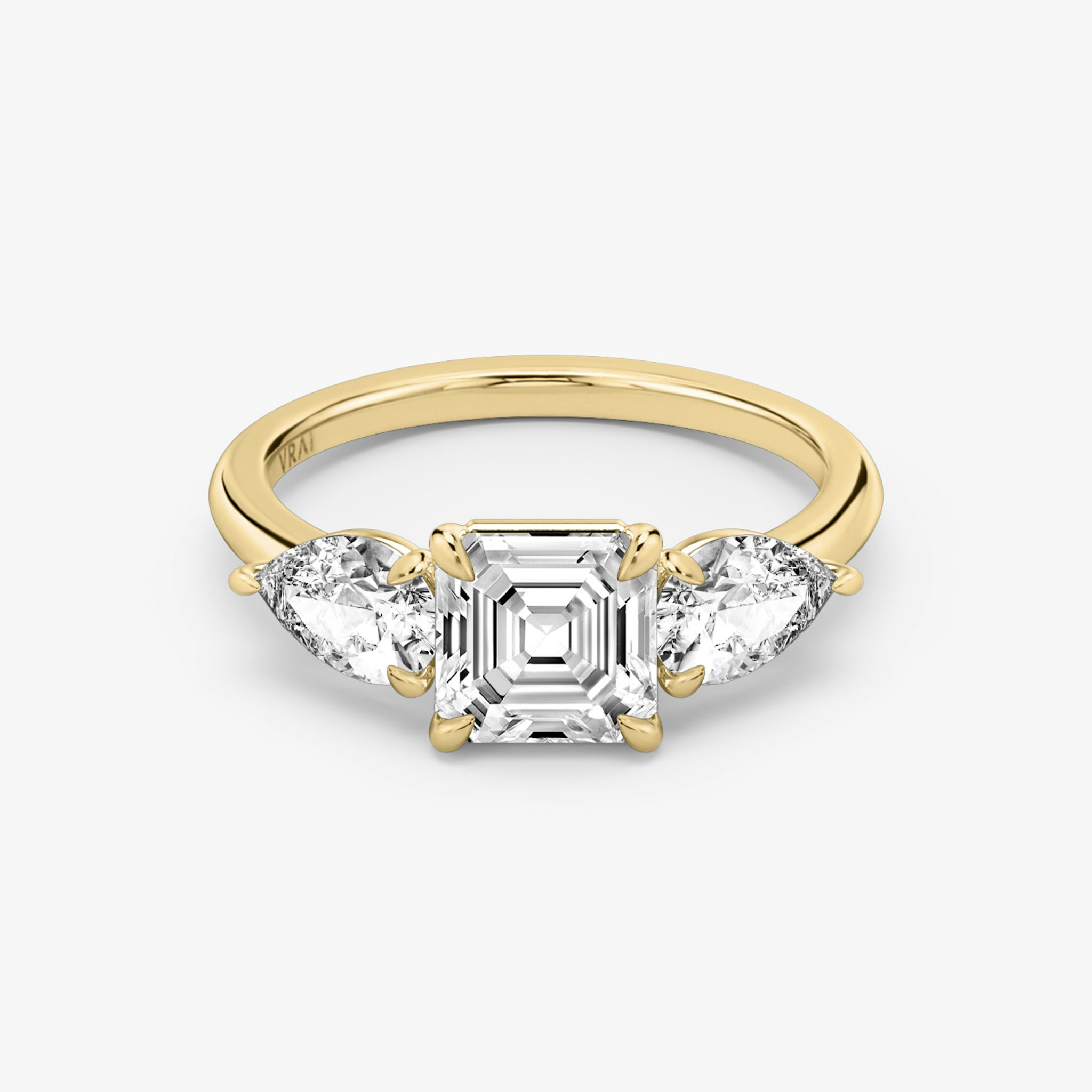 The Three Stone | Asscher | 18k | Yellow Gold | bandAccent: Plain | sideStoneCarat: 0.50ct | sideStoneShape: Pear | diamondOrientation: vertical | caratWeight: other
