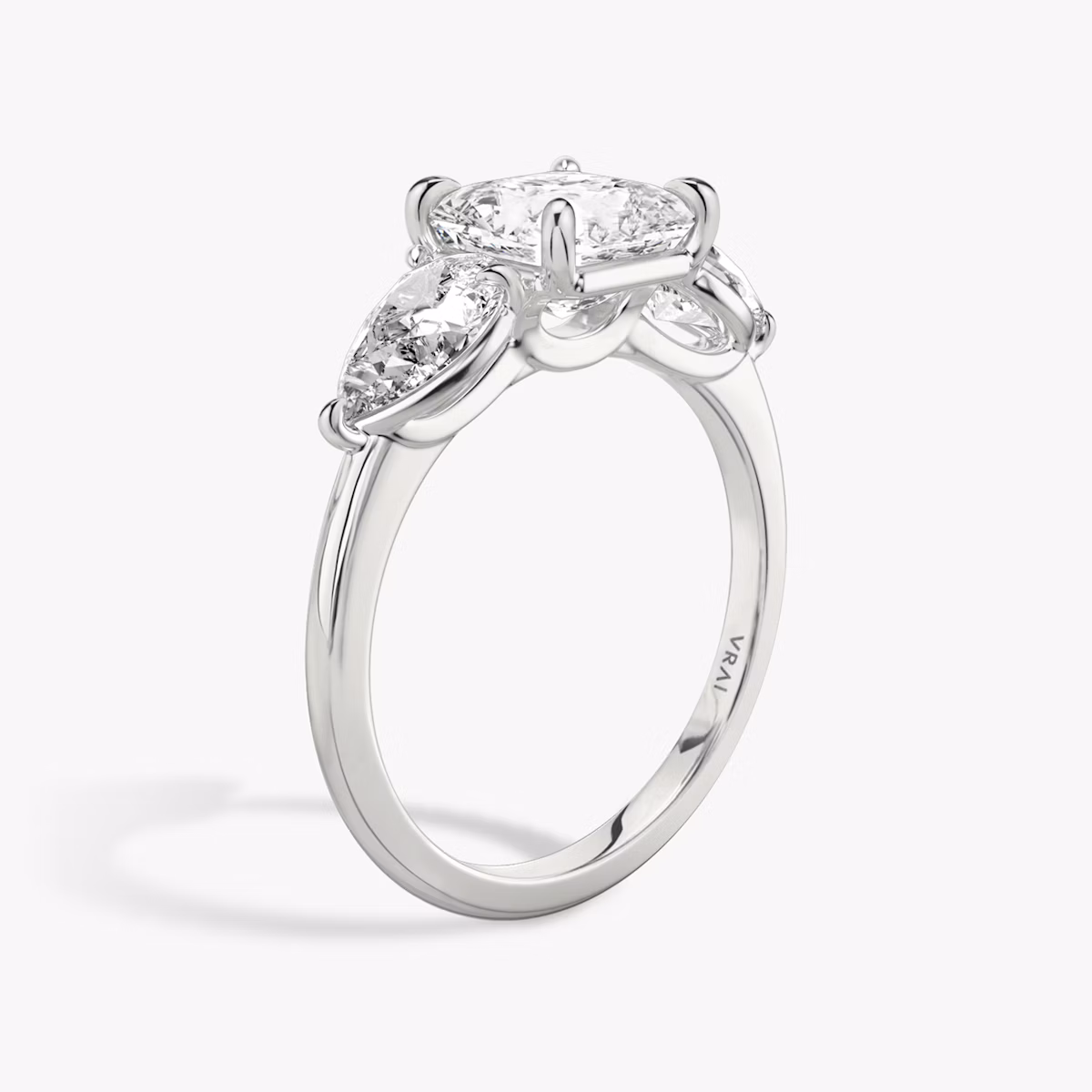 The Three Stone | Asscher | 18k | White Gold | bandAccent: Plain | sideStoneCarat: 0.50ct | sideStoneShape: Pear | diamondOrientation: vertical | caratWeight: other