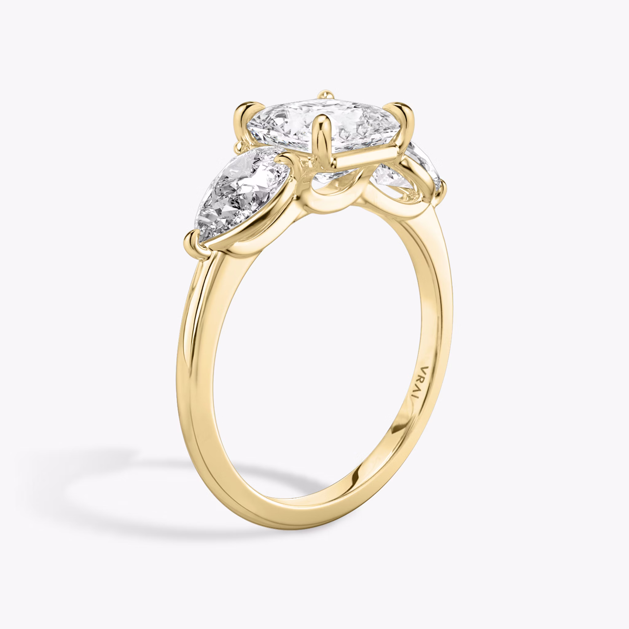 The Three Stone | Asscher | 18k | Yellow Gold | bandAccent: Plain | sideStoneCarat: 0.50ct | sideStoneShape: Pear | diamondOrientation: vertical | caratWeight: other