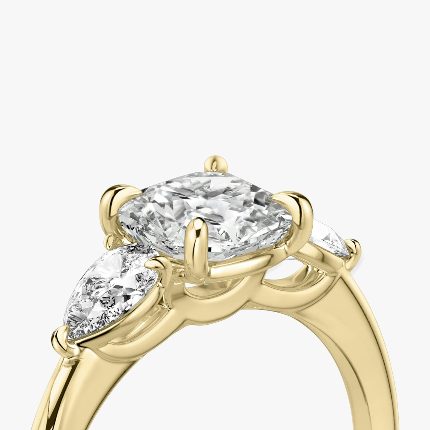 The Three Stone | Cushion | 18k | Yellow Gold | bandAccent: Plain | sideStoneCarat: 0.25ct | sideStoneShape: Pear | diamondOrientation: vertical | caratWeight: other