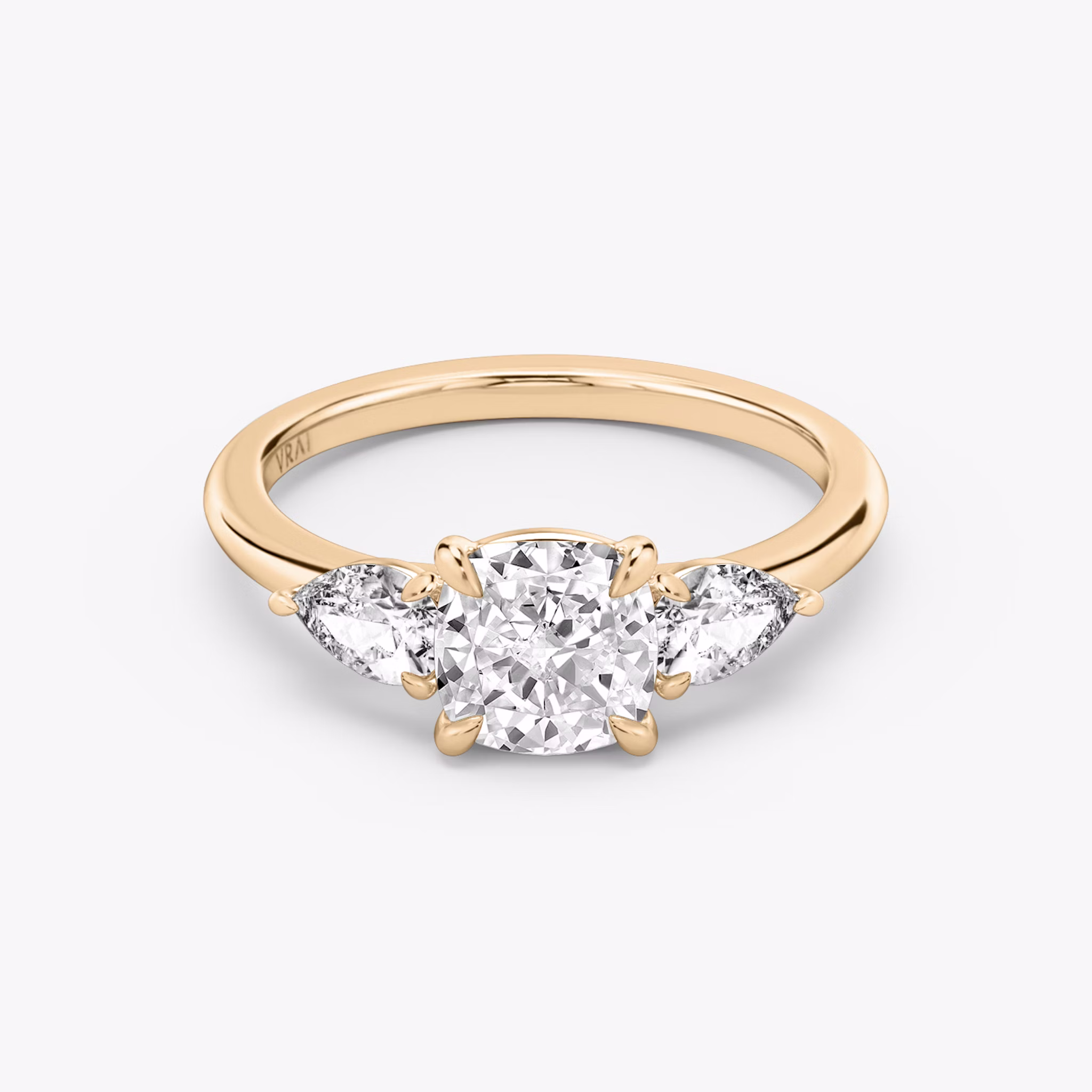 The Three Stone | Cushion | 14k | Rose Gold | bandAccent: Plain | sideStoneCarat: 0.25ct | sideStoneShape: Pear | diamondOrientation: vertical | caratWeight: other
