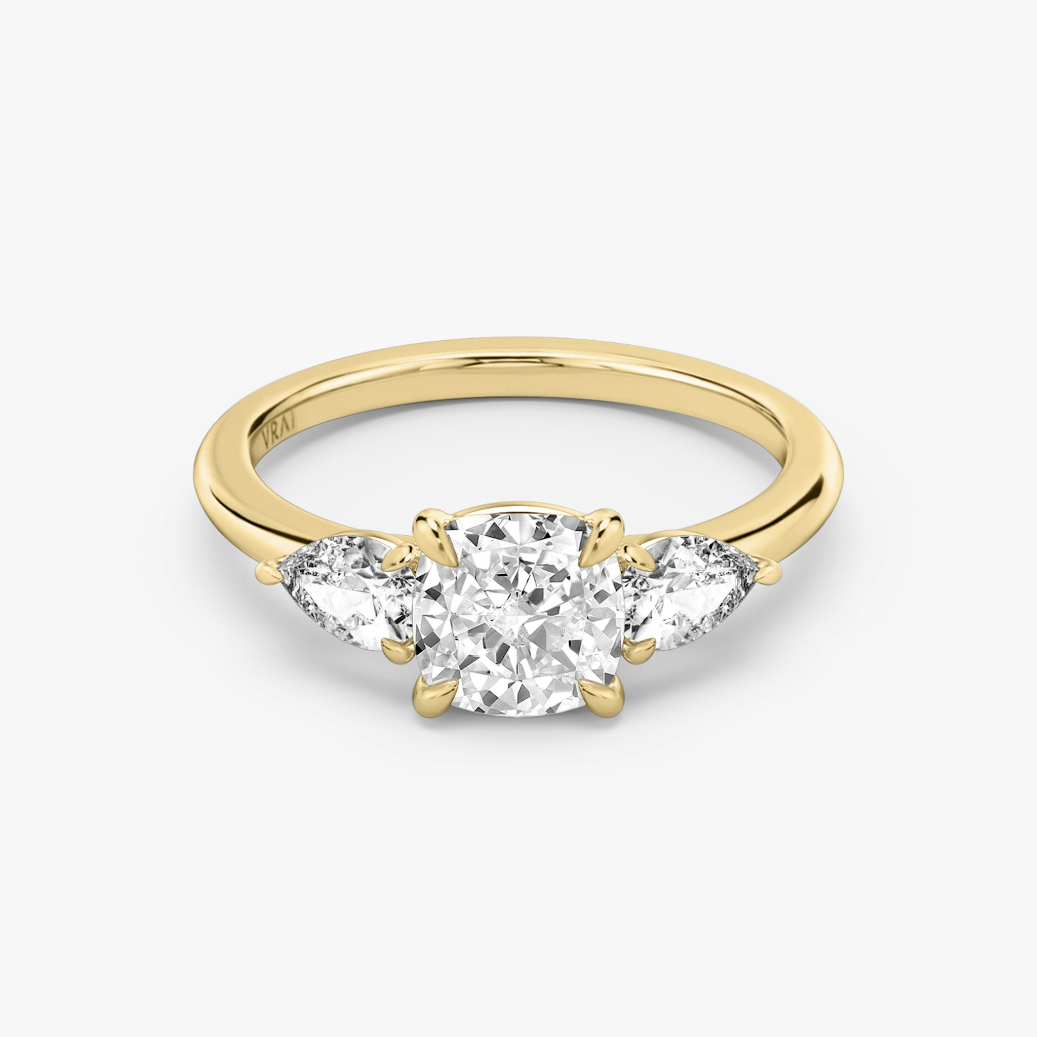 The Three Stone | Cushion | 18k | Yellow Gold | bandAccent: Plain | sideStoneCarat: 0.25ct | sideStoneShape: Pear | diamondOrientation: vertical | caratWeight: other