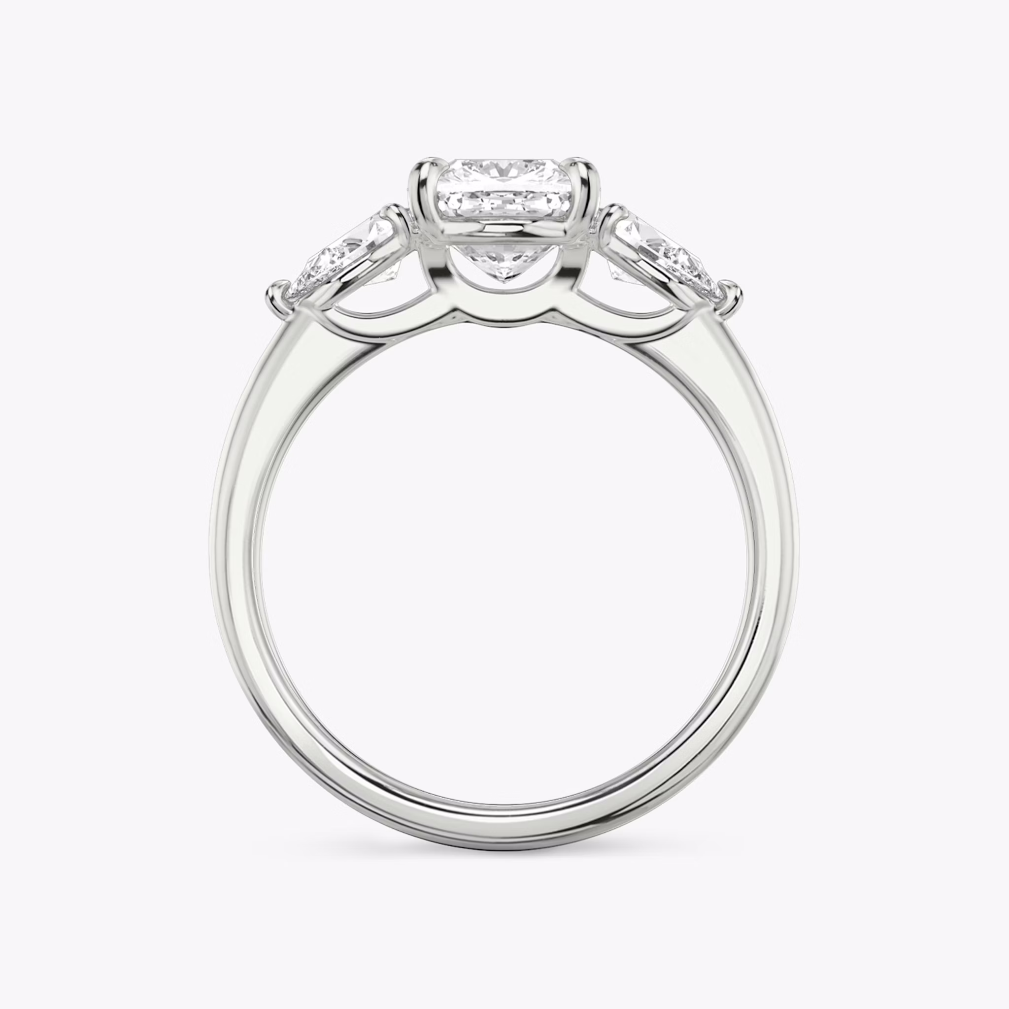 The Three Stone | Cushion | Platinum | bandAccent: Plain | sideStoneCarat: 0.25ct | sideStoneShape: Pear | diamondOrientation: vertical | caratWeight: other