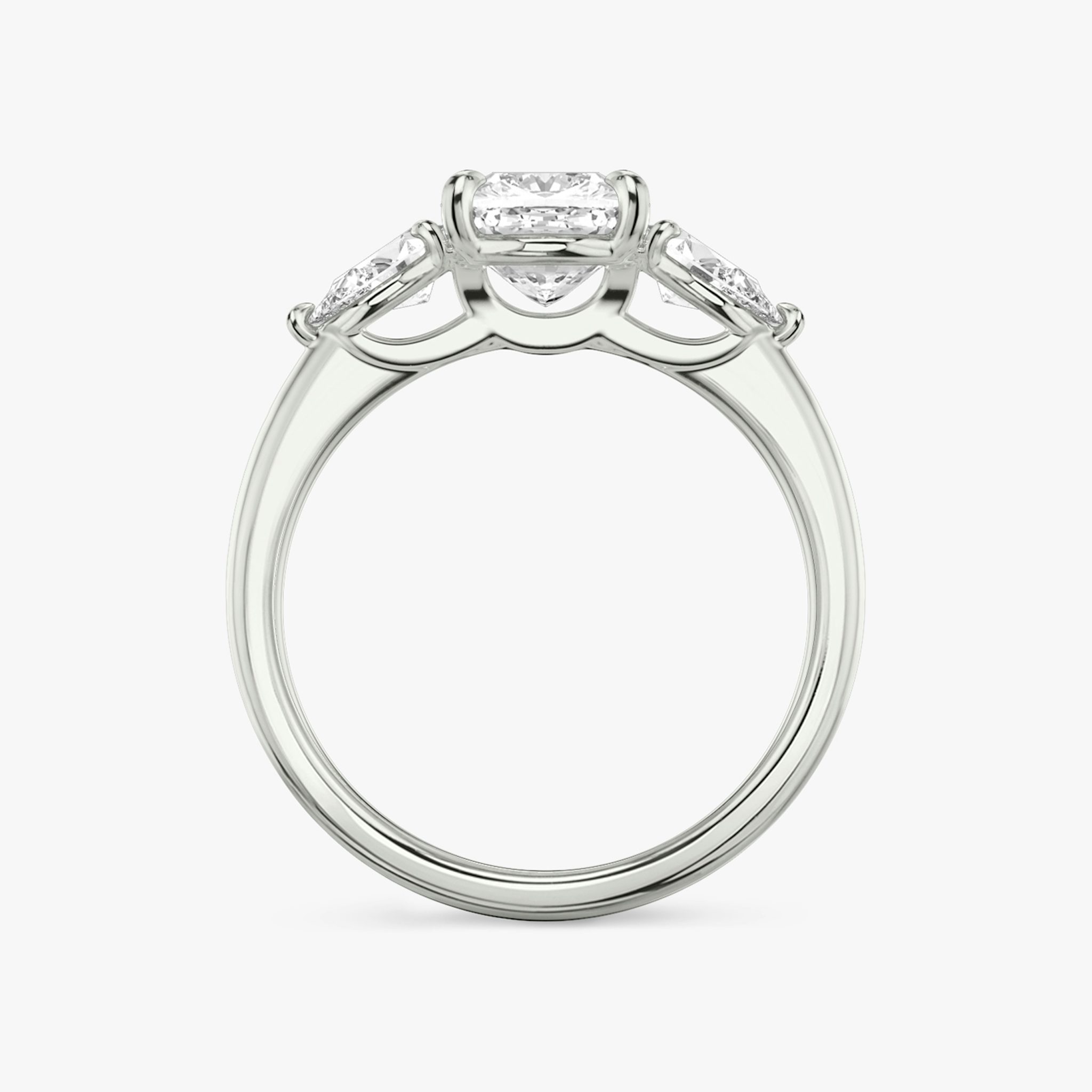 The Three Stone | Cushion | Platinum | bandAccent: Plain | sideStoneCarat: 0.25ct | sideStoneShape: Pear | diamondOrientation: vertical | caratWeight: other