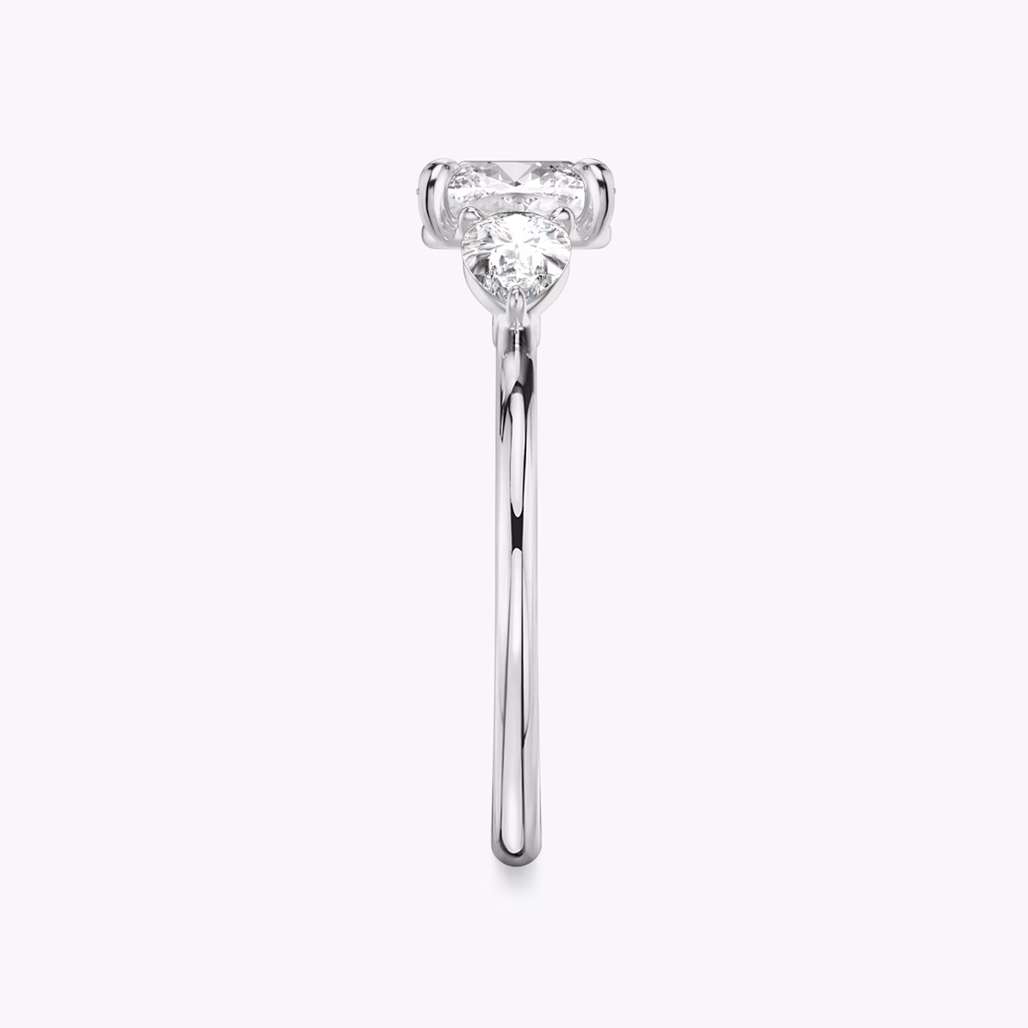 The Three Stone | Cushion | Platinum | bandAccent: Plain | sideStoneCarat: 0.25ct | sideStoneShape: Pear | diamondOrientation: vertical | caratWeight: other