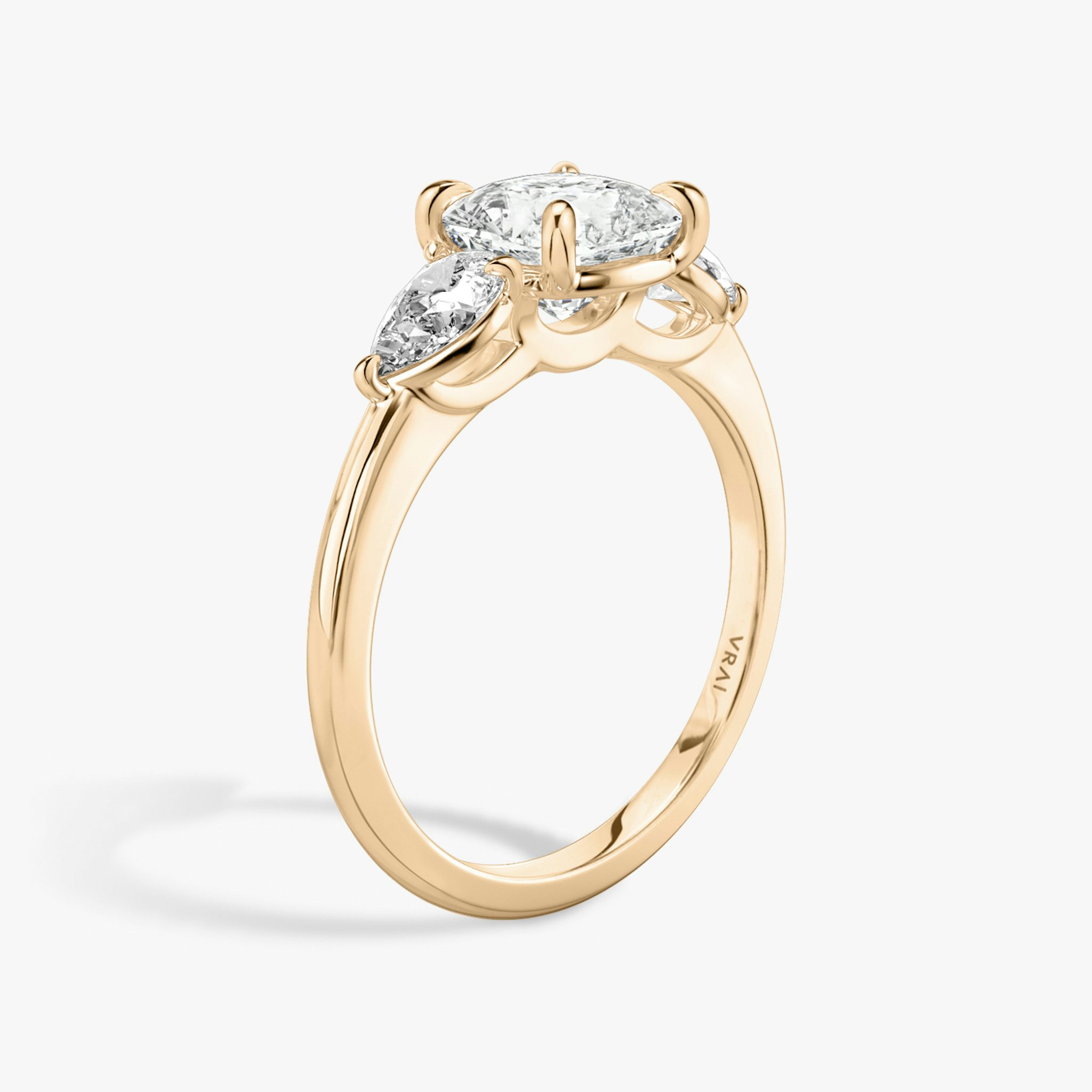 The Three Stone | Cushion | 14k | Rose Gold | bandAccent: Plain | sideStoneCarat: 0.25ct | sideStoneShape: Pear | diamondOrientation: vertical | caratWeight: other