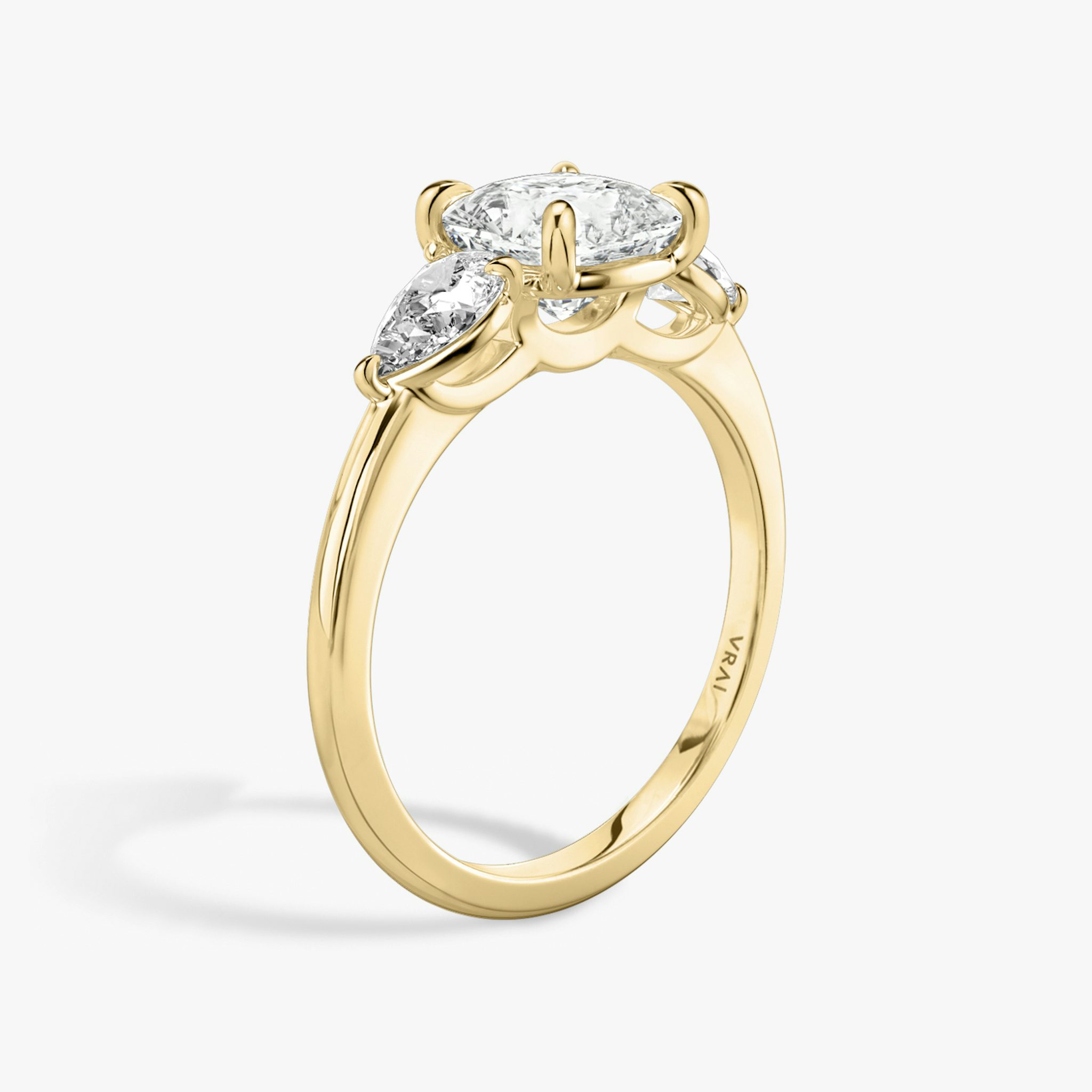 The Three Stone | Cushion | 18k | Yellow Gold | bandAccent: Plain | sideStoneCarat: 0.25ct | sideStoneShape: Pear | diamondOrientation: vertical | caratWeight: other