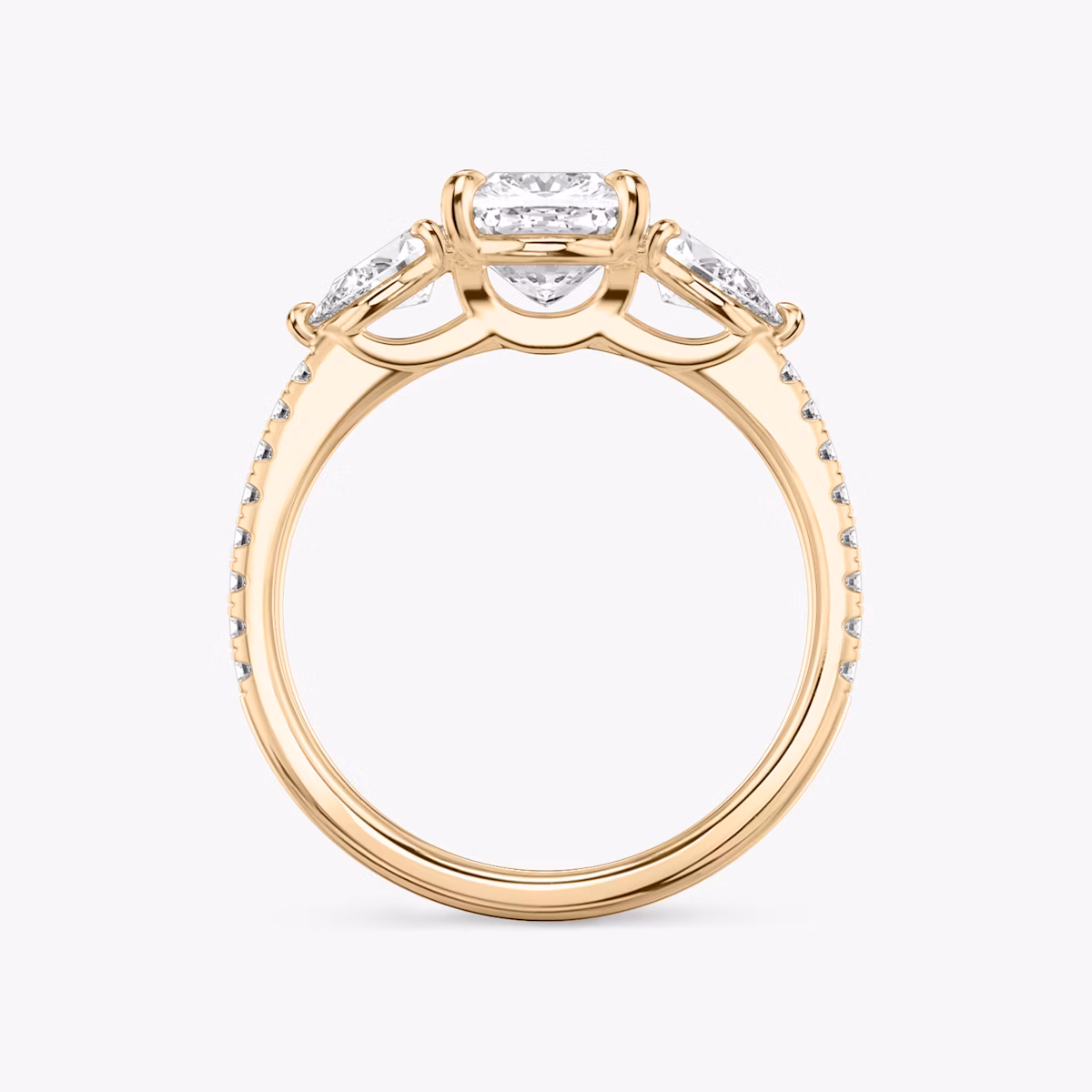 The Three Stone | Cushion | 14k | Rose Gold | bandAccent: Pavé | sideStoneCarat: 0.25ct | sideStoneShape: Pear | diamondOrientation: vertical | caratWeight: other