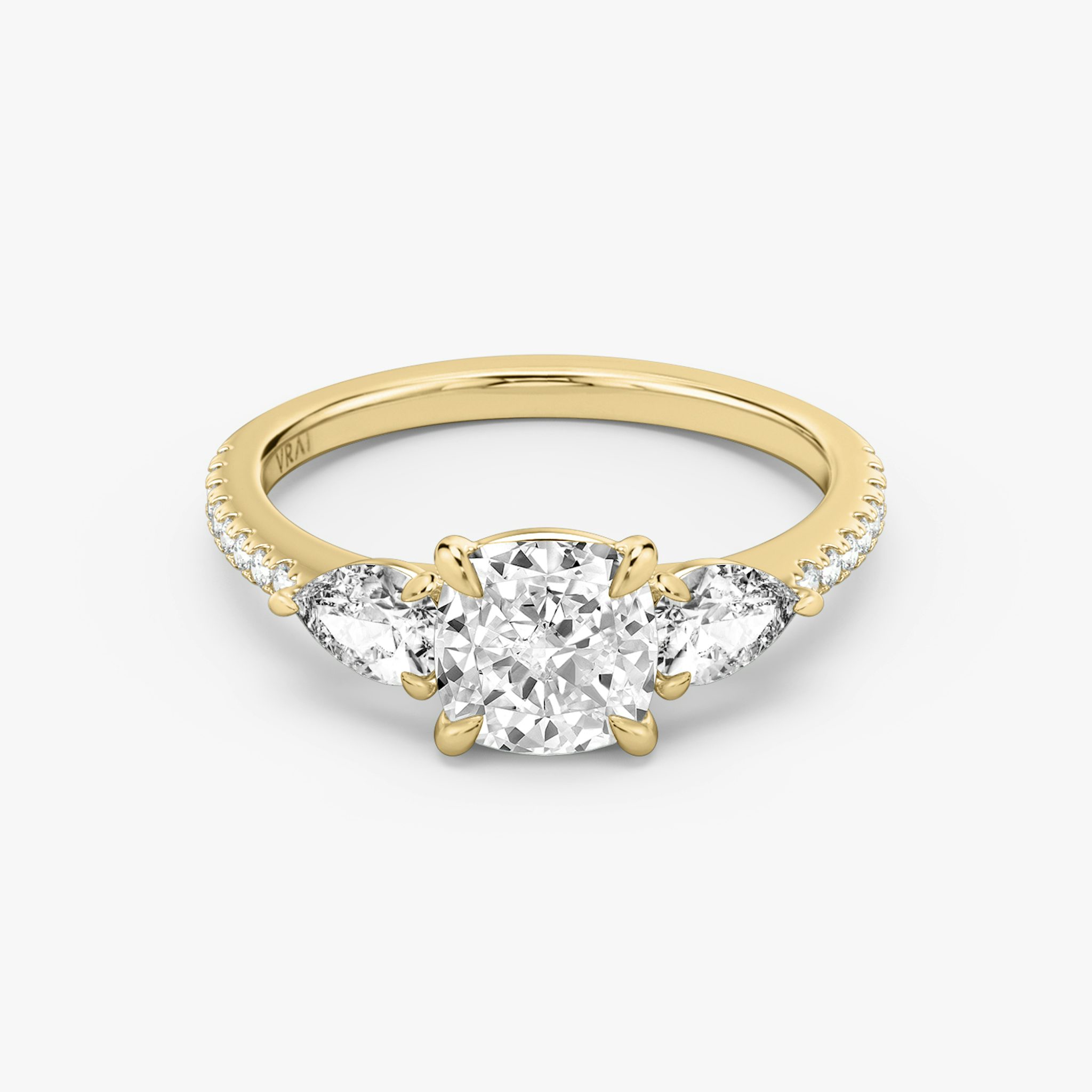 The Three Stone | Cushion | 18k | Yellow Gold | bandAccent: Pavé | sideStoneCarat: 0.25ct | sideStoneShape: Pear | diamondOrientation: vertical | caratWeight: other
