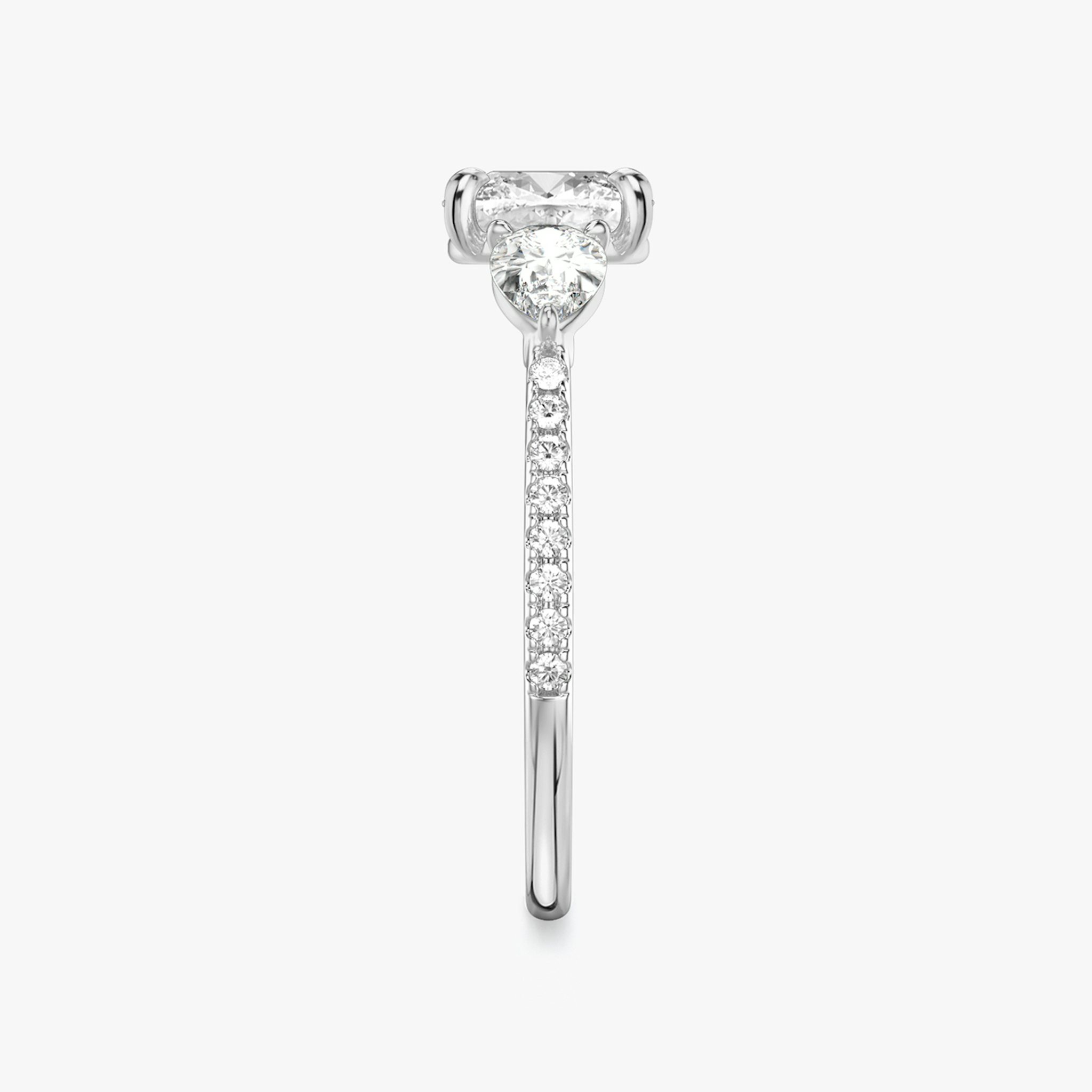 The Three Stone | Cushion | 18k | White Gold | bandAccent: Pavé | sideStoneCarat: 0.25ct | sideStoneShape: Pear | diamondOrientation: vertical | caratWeight: other