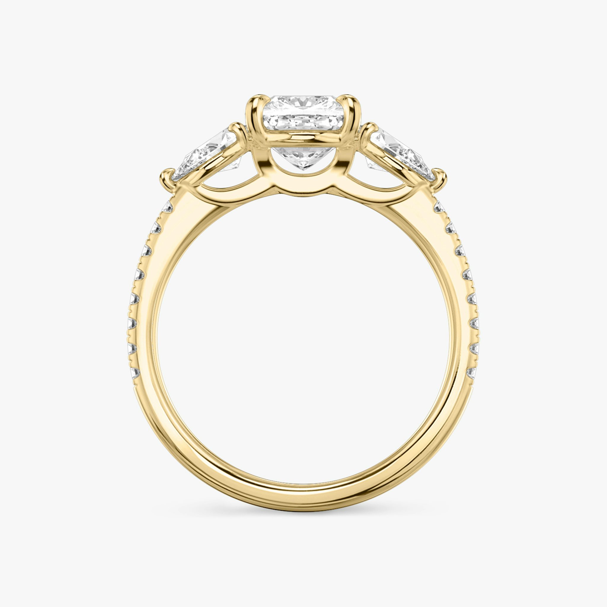 The Three Stone | Cushion | 18k | Yellow Gold | bandAccent: Pavé | sideStoneCarat: 0.25ct | sideStoneShape: Pear | diamondOrientation: vertical | caratWeight: other