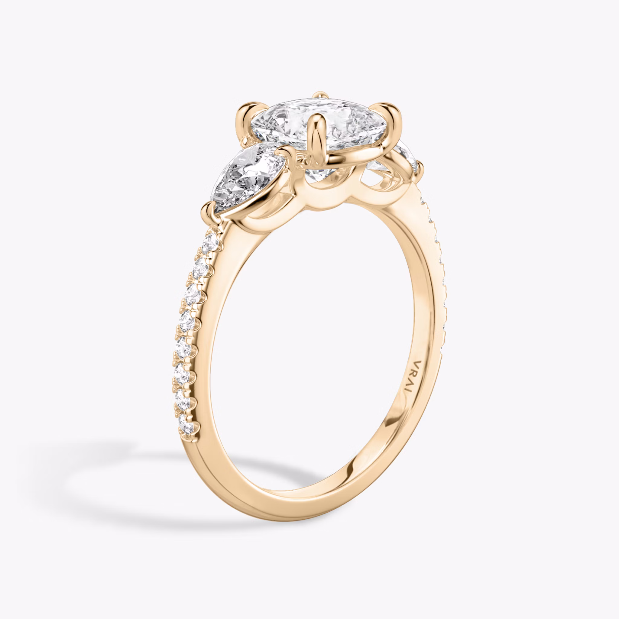 The Three Stone | Cushion | 14k | Rose Gold | bandAccent: Pavé | sideStoneCarat: 0.25ct | sideStoneShape: Pear | diamondOrientation: vertical | caratWeight: other
