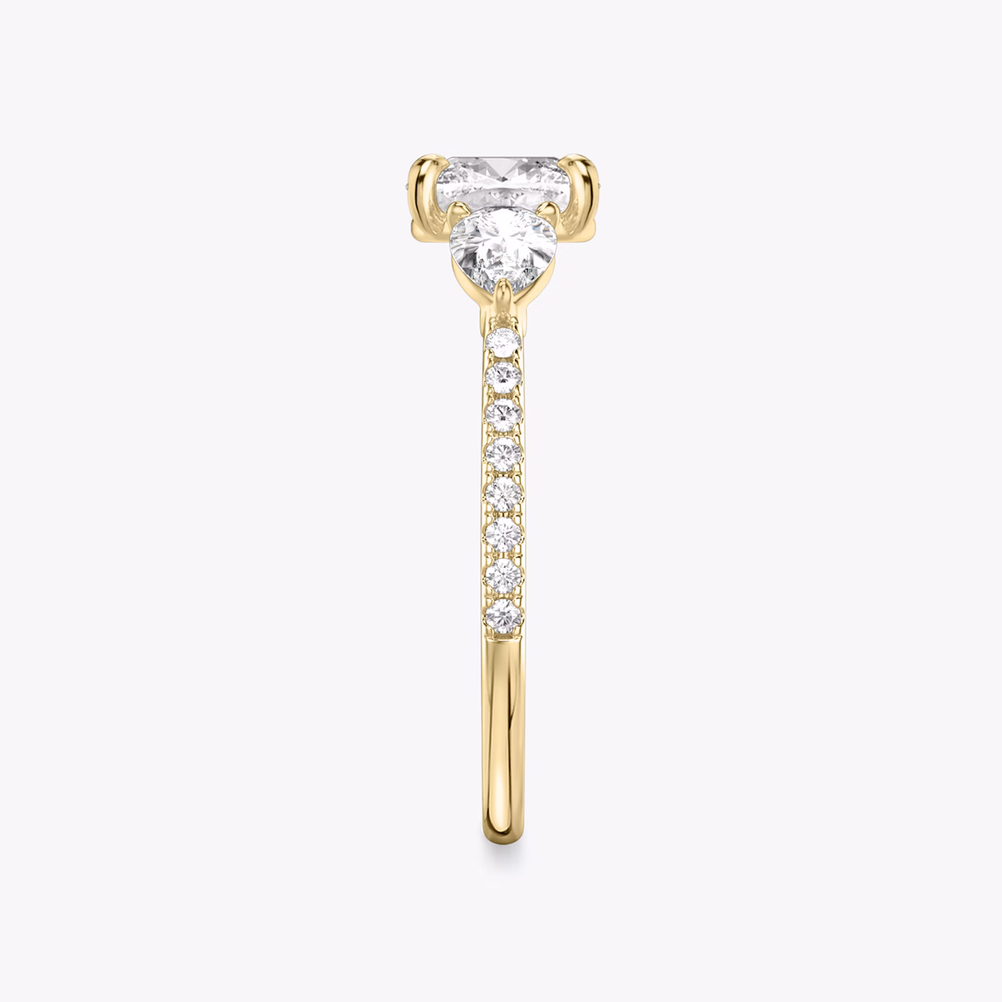 The Three Stone | Cushion | 18k | Yellow Gold | bandAccent: Pavé | sideStoneCarat: 0.25ct | sideStoneShape: Pear | diamondOrientation: vertical | caratWeight: other
