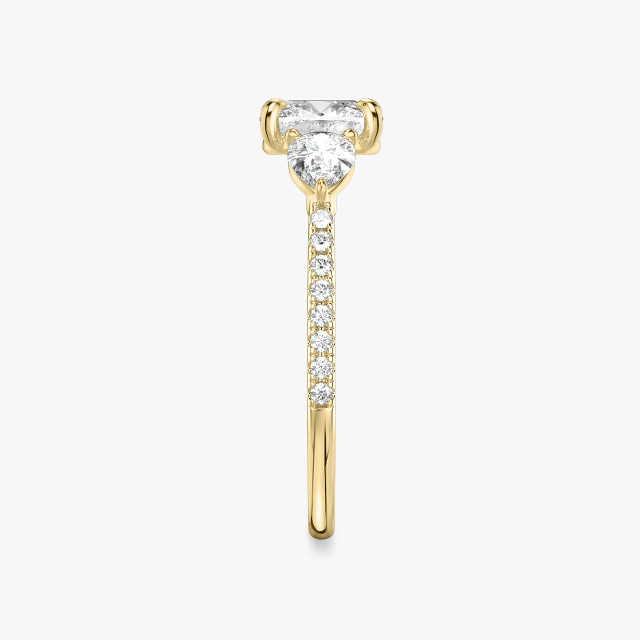 The Three Stone | Cushion | 18k | Yellow Gold | bandAccent: Pavé | sideStoneCarat: 0.25ct | sideStoneShape: Pear | diamondOrientation: vertical | caratWeight: other