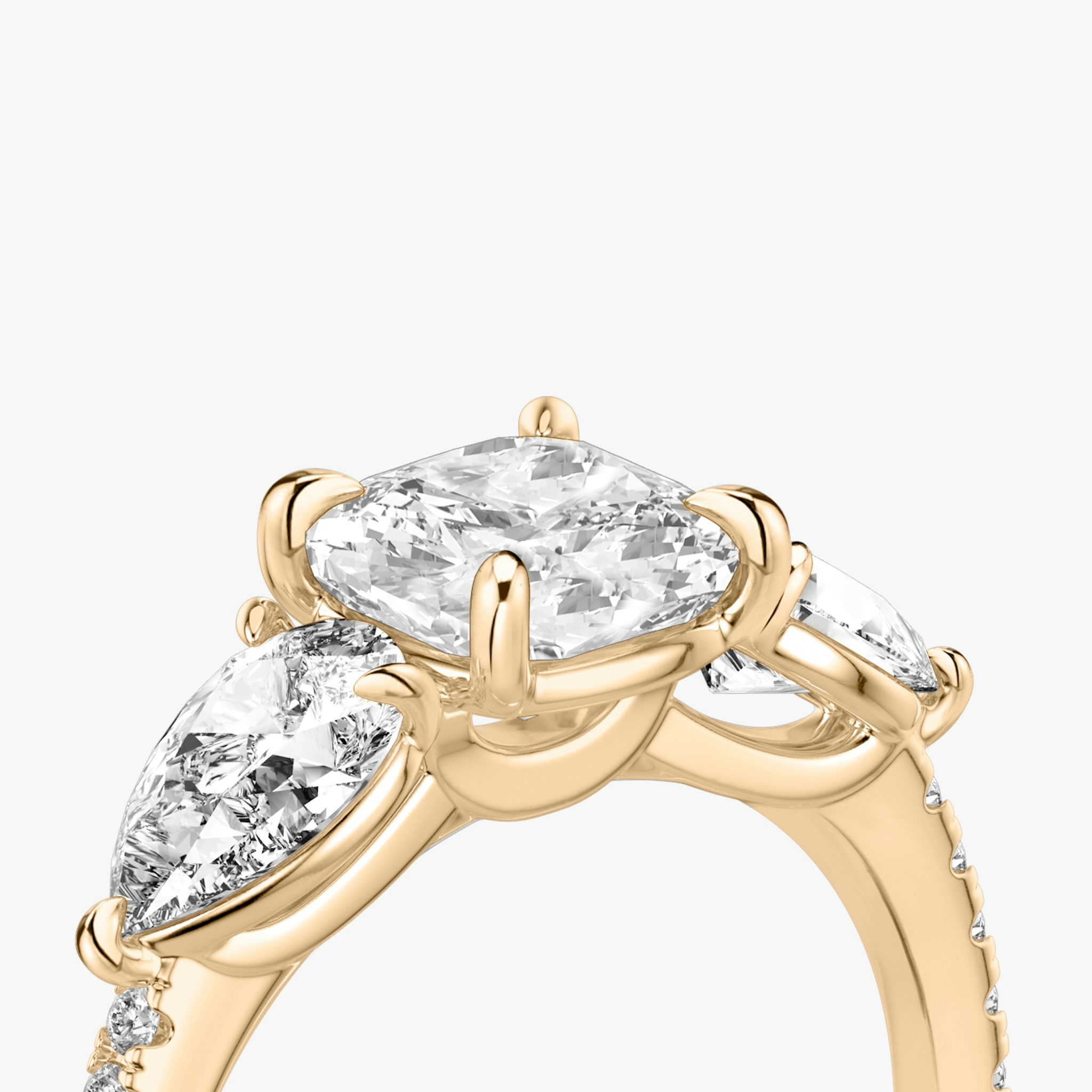 The Three Stone | Cushion | 14k | Rose Gold | bandAccent: Pavé | sideStoneCarat: 0.50ct | sideStoneShape: Pear | diamondOrientation: vertical | caratWeight: other