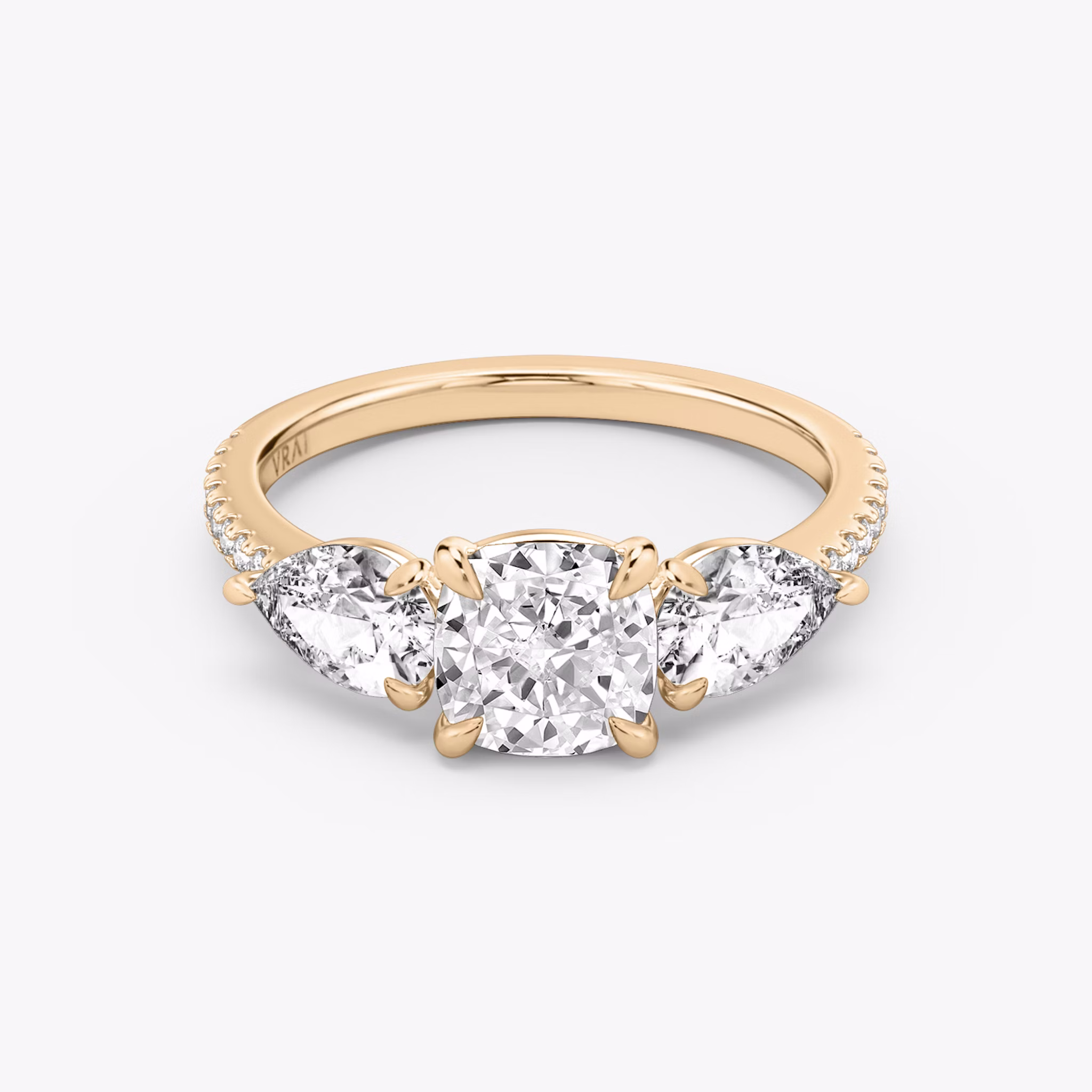 The Three Stone | Cushion | 14k | Rose Gold | bandAccent: Pavé | sideStoneCarat: 0.50ct | sideStoneShape: Pear | diamondOrientation: vertical | caratWeight: other