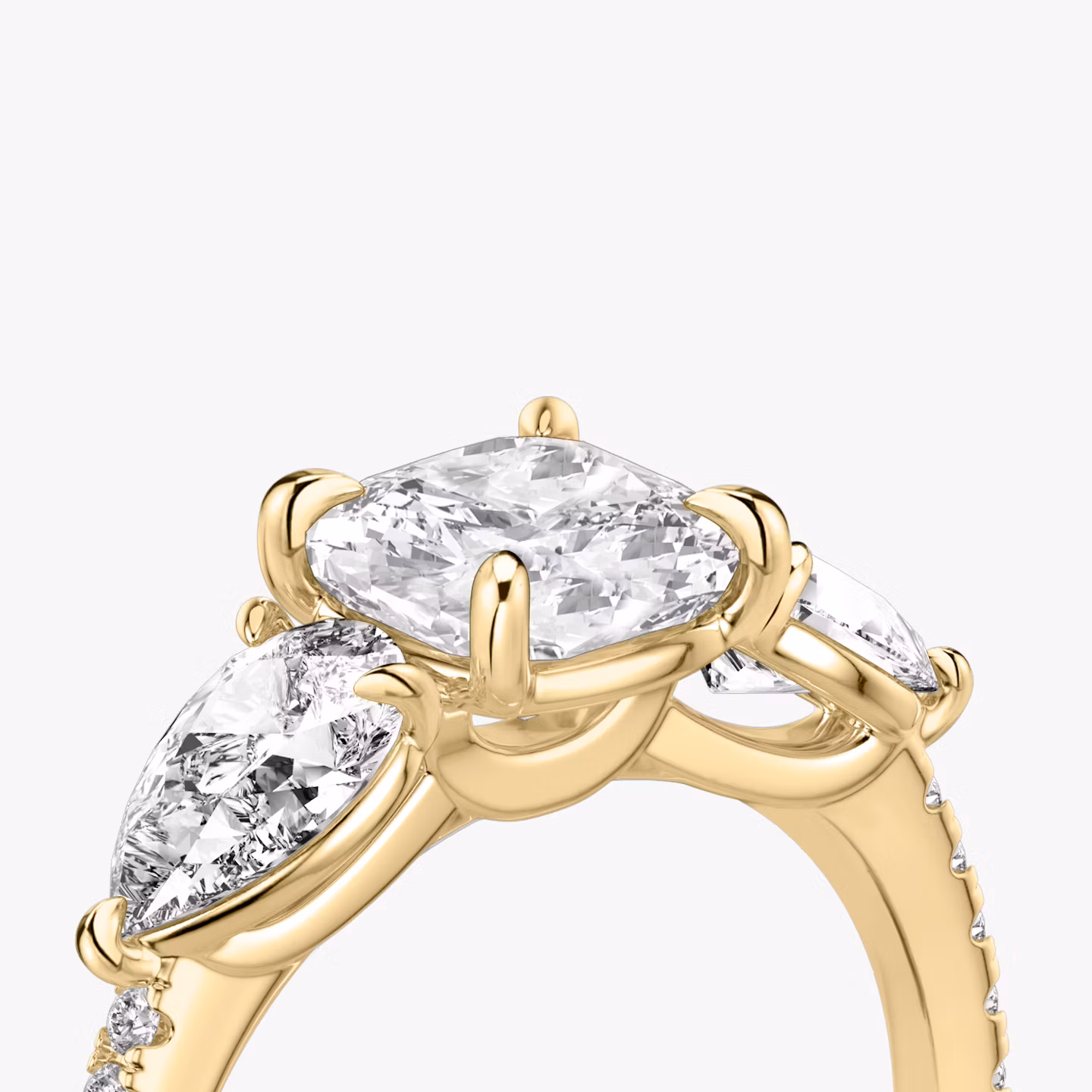 The Three Stone | Cushion | 18k | Yellow Gold | bandAccent: Pavé | sideStoneCarat: 0.50ct | sideStoneShape: Pear | diamondOrientation: vertical | caratWeight: other
