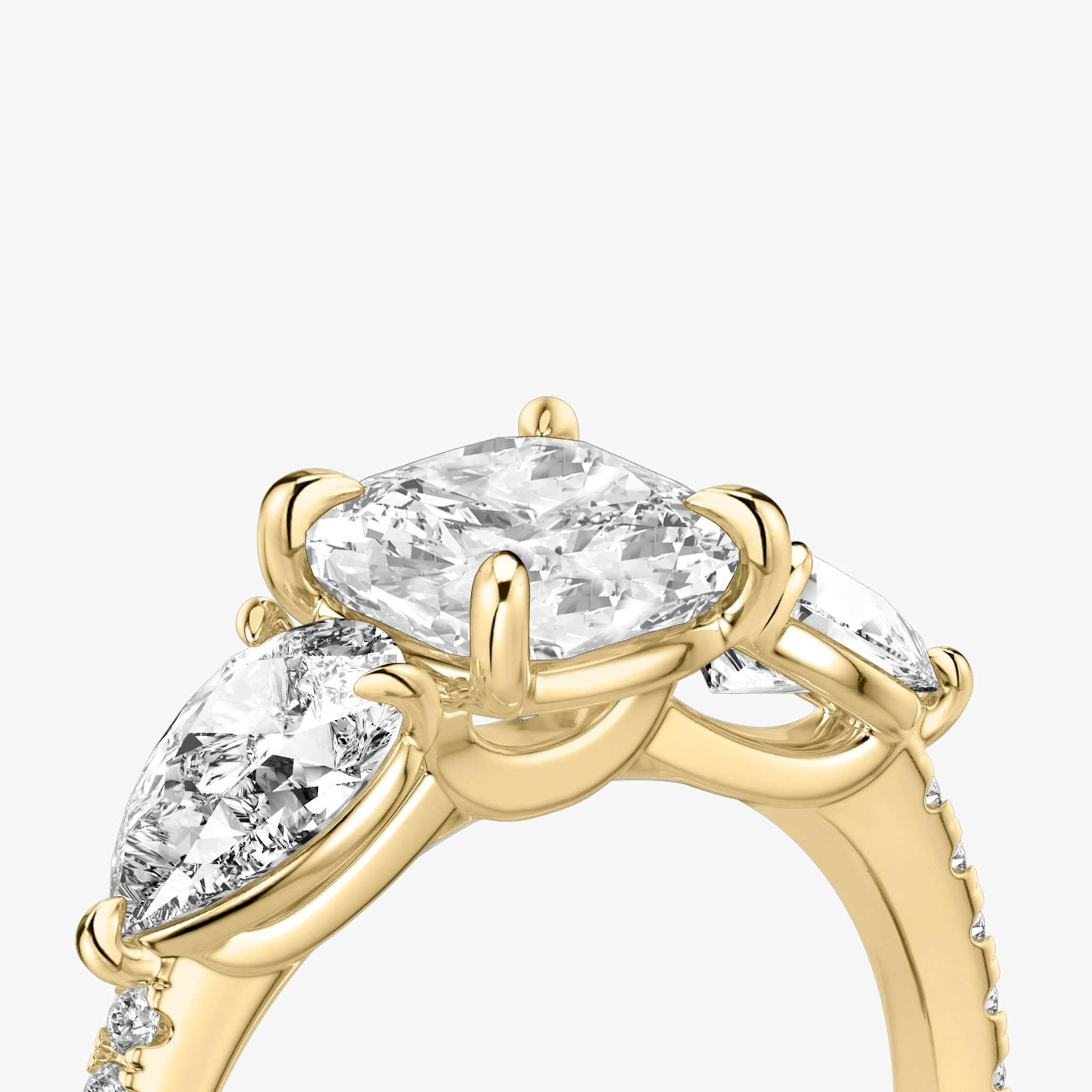 The Three Stone | Cushion | 18k | Yellow Gold | bandAccent: Pavé | sideStoneCarat: 0.50ct | sideStoneShape: Pear | diamondOrientation: vertical | caratWeight: other