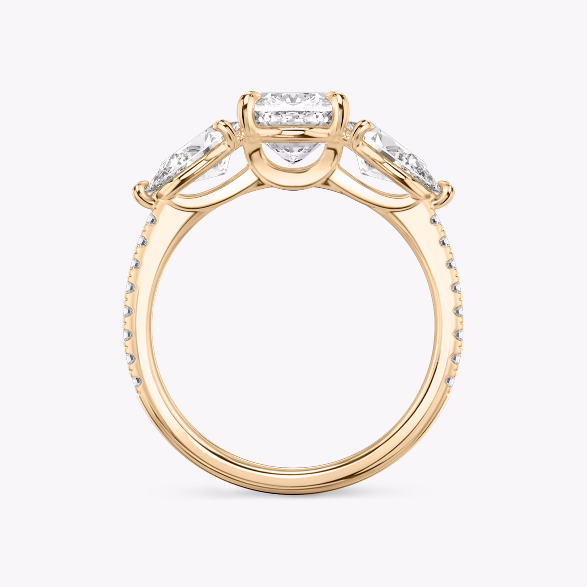 The Three Stone | Cushion | 14k | Rose Gold | bandAccent: Pavé | sideStoneCarat: 0.50ct | sideStoneShape: Pear | diamondOrientation: vertical | caratWeight: other