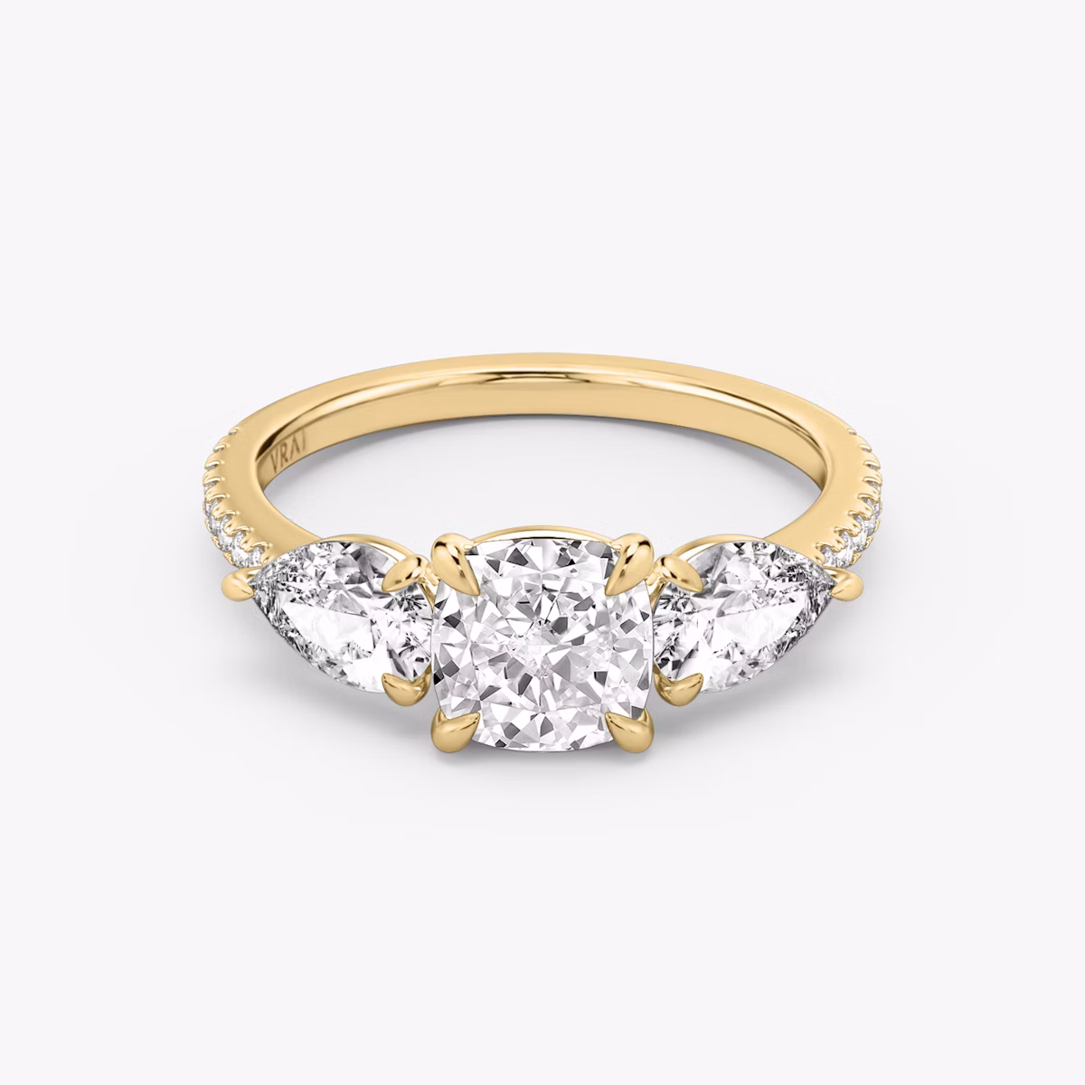 The Three Stone | Cushion | 18k | Yellow Gold | bandAccent: Pavé | sideStoneCarat: 0.50ct | sideStoneShape: Pear | diamondOrientation: vertical | caratWeight: other