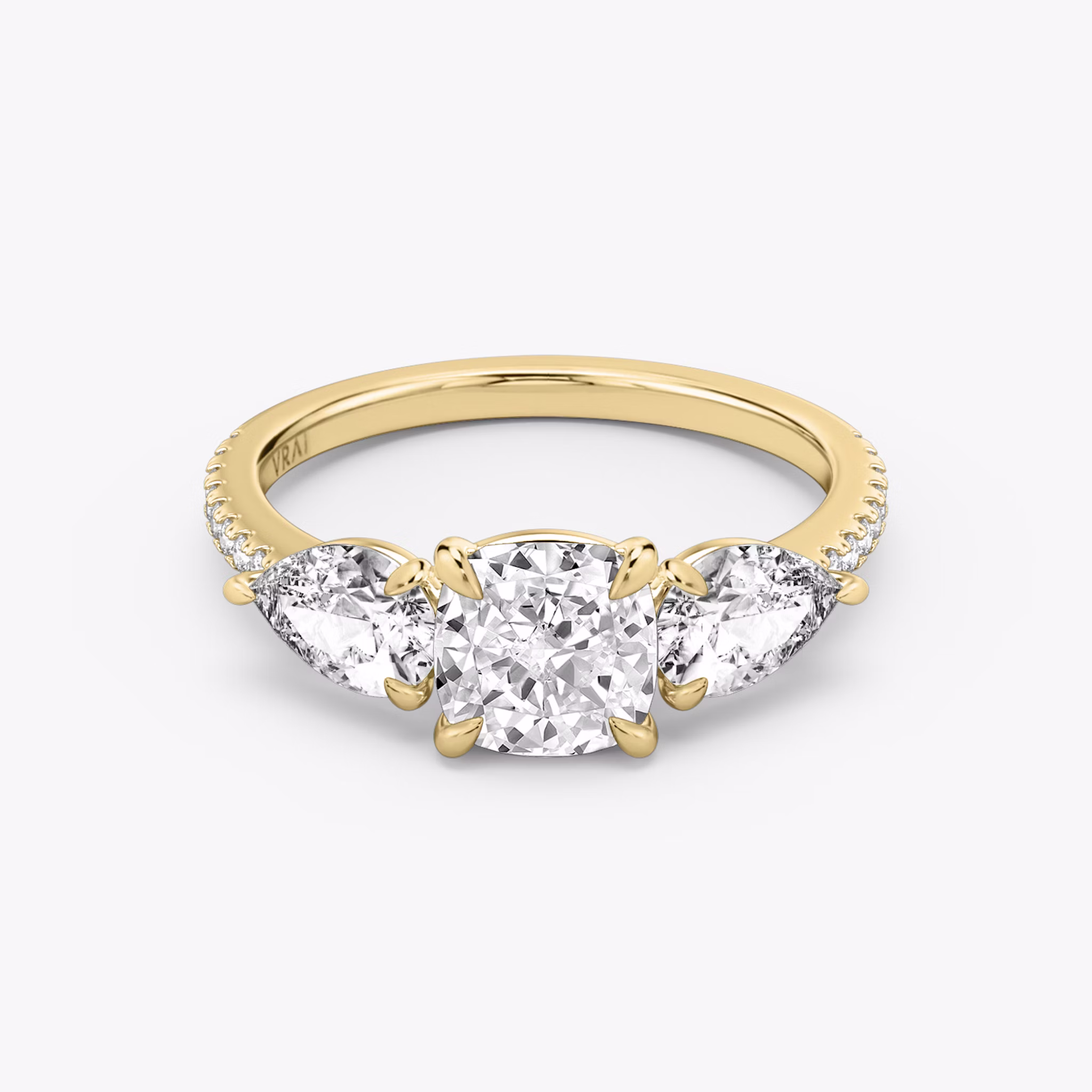 The Three Stone | Cushion | 18k | Yellow Gold | bandAccent: Pavé | sideStoneCarat: 0.50ct | sideStoneShape: Pear | diamondOrientation: vertical | caratWeight: other