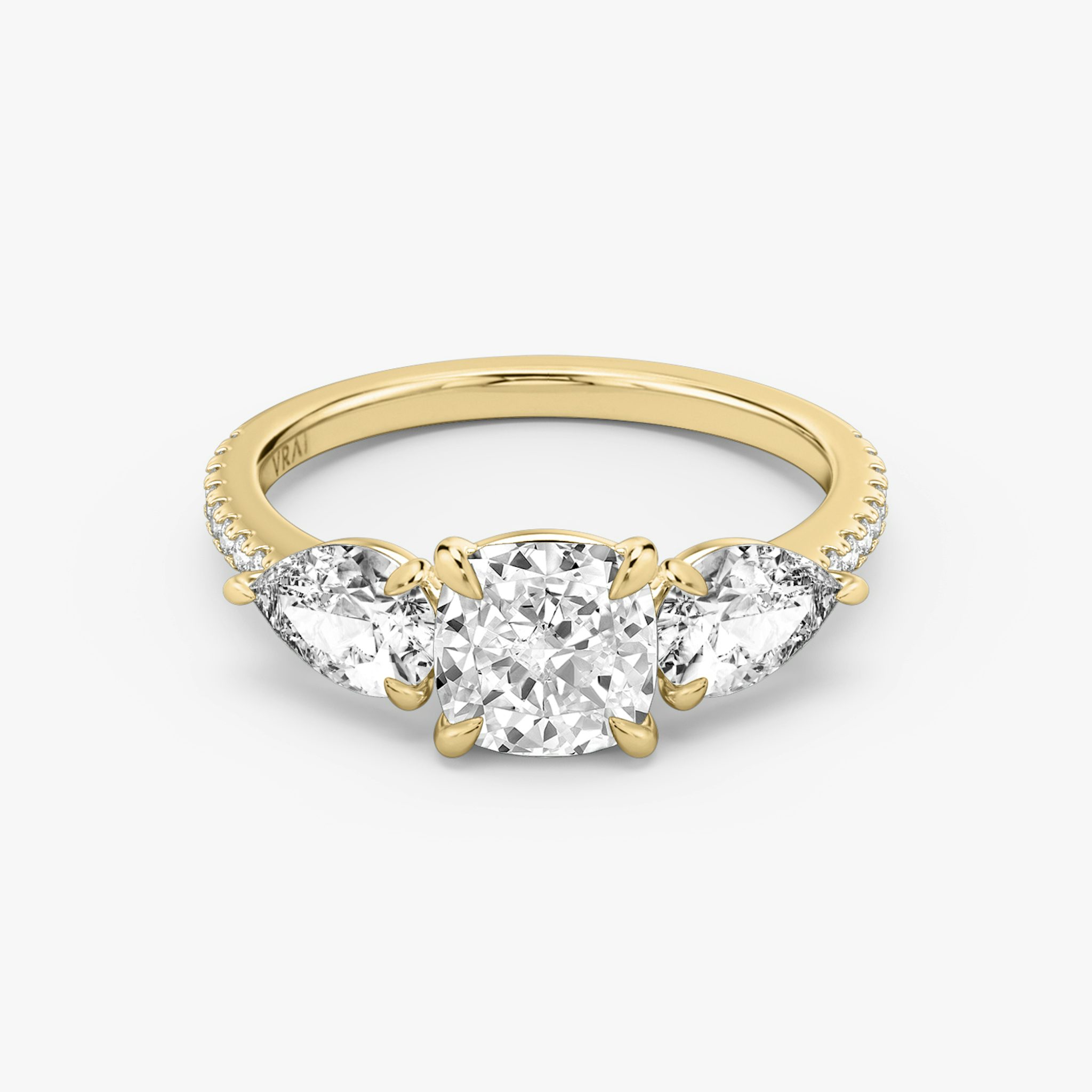 The Three Stone | Cushion | 18k | Yellow Gold | bandAccent: Pavé | sideStoneCarat: 0.50ct | sideStoneShape: Pear | diamondOrientation: vertical | caratWeight: other