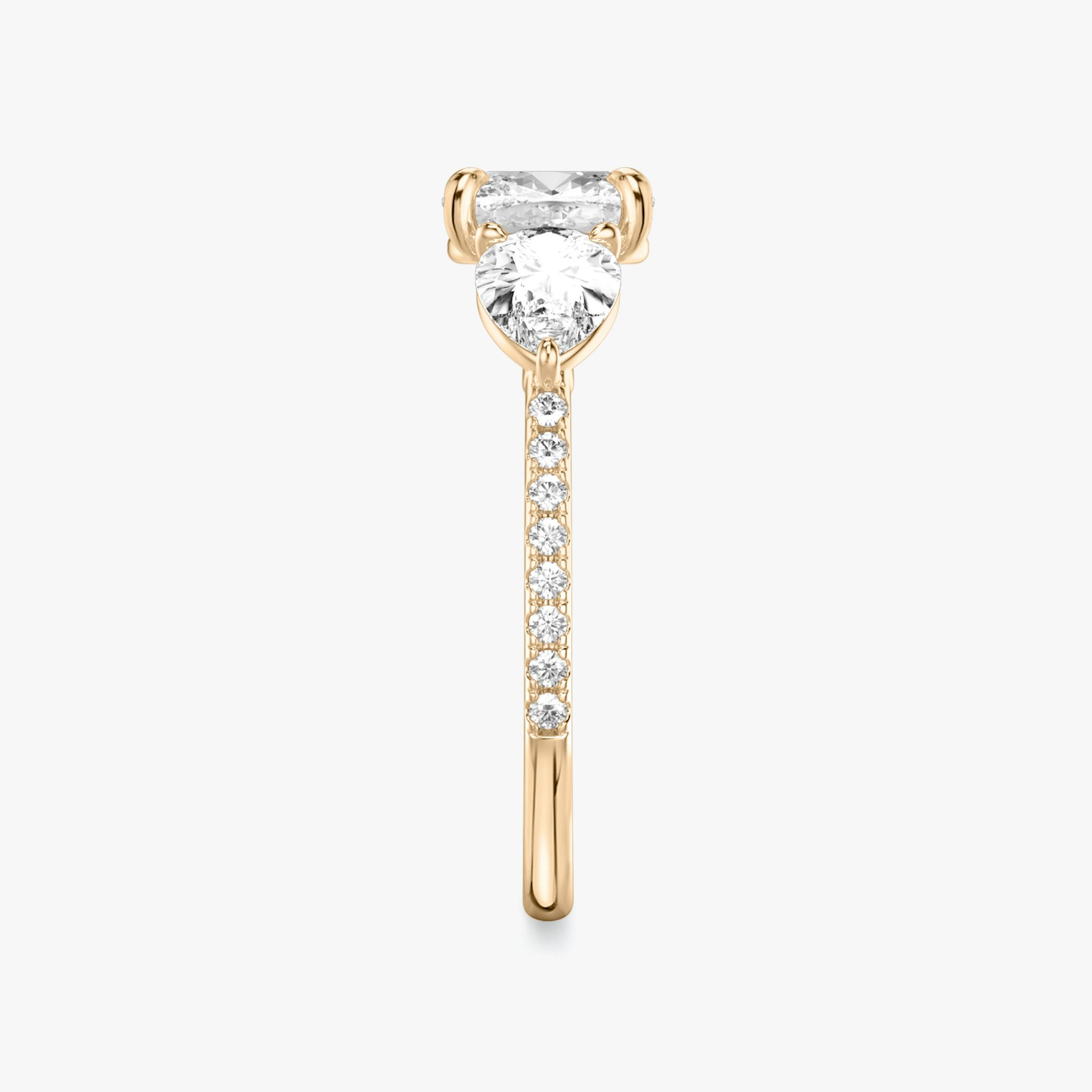 The Three Stone | Cushion | 14k | Rose Gold | bandAccent: Pavé | sideStoneCarat: 0.50ct | sideStoneShape: Pear | diamondOrientation: vertical | caratWeight: other